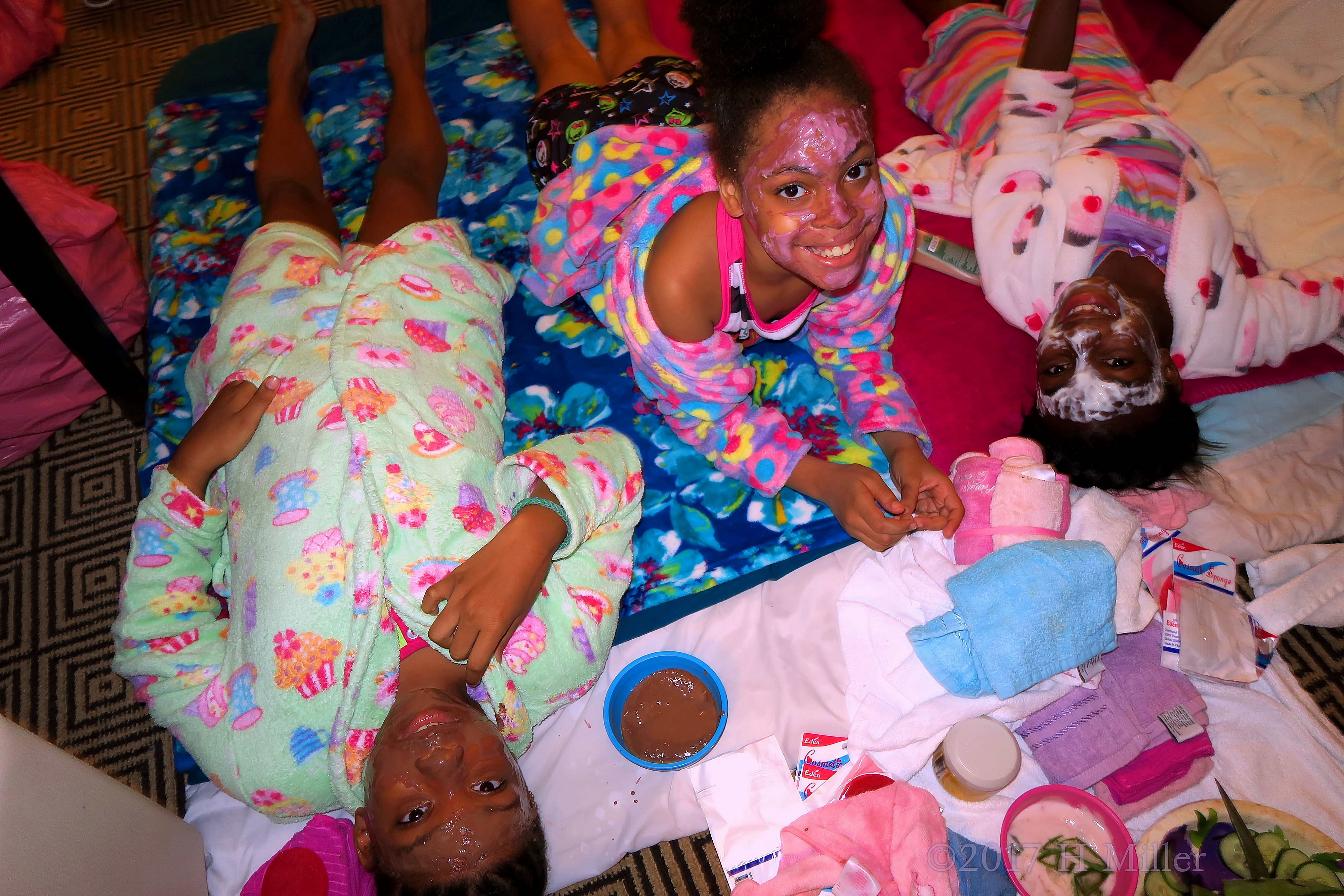 Smiling And Chiilling With Their Kids Facial Masques On. Smiling And Chiilling With Their Kids Facial Masques On.