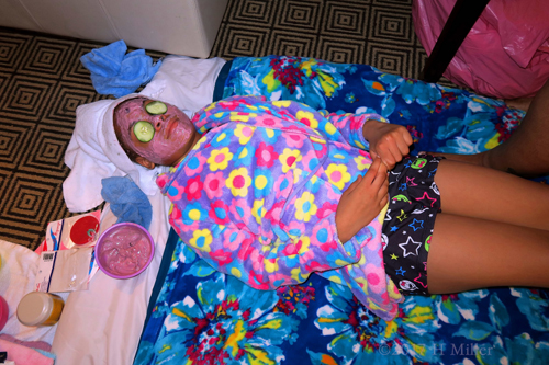 Relaxing With Her Kids Facial Masque On. Relaxing With Her Kids Facial Masque On.