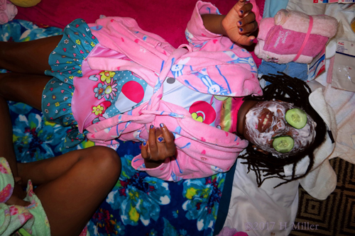 She's Having Fun Getting Her Girls Facial, Complete With Masque And Cukes On The Eyes. She's Having Fun Getting Her Girls Facial, Complete With Masque And Cukes On The Eyes.