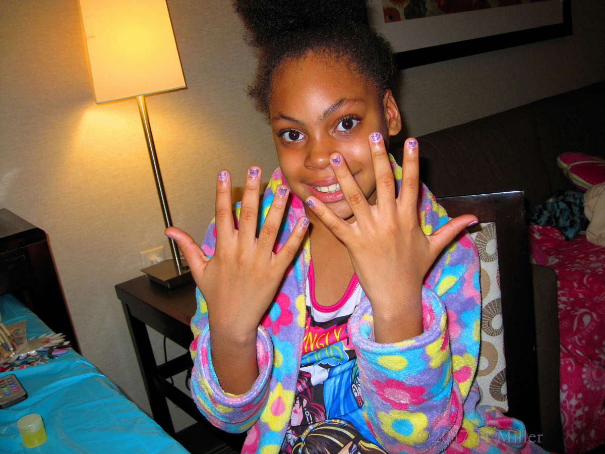 Smiling With Her New Girls Manicure. 1