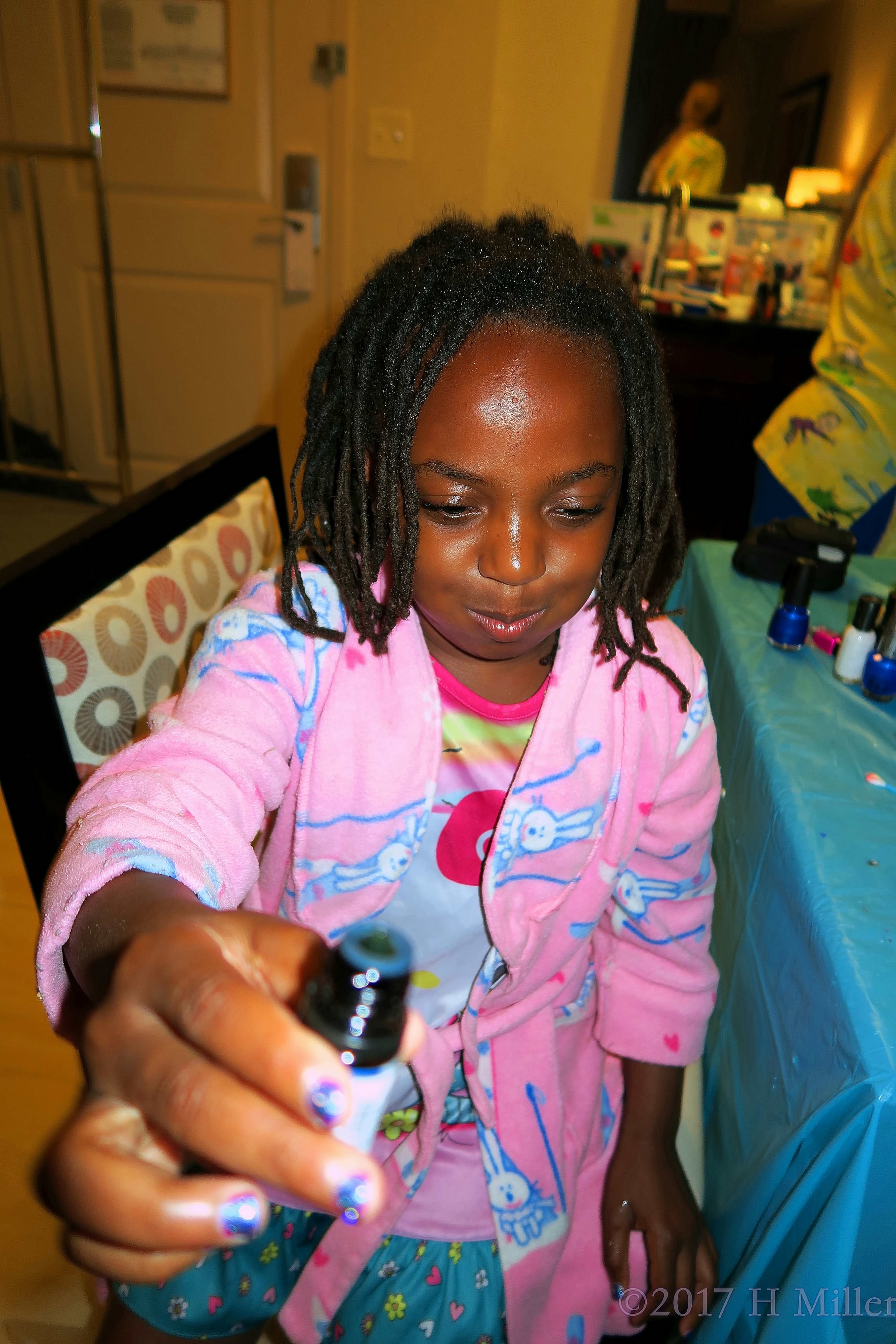 Handing Back The Essential Oil For Her Kids Pedi Footbath. Handing Back The Essential Oil For Her Kids Pedi Footbath.