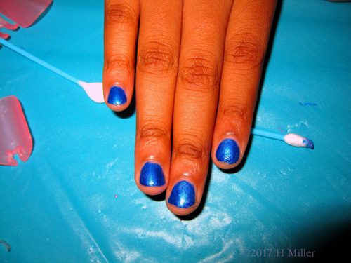 A Close Up Of Her Beautiful Royal Blue Girls Manicure! 