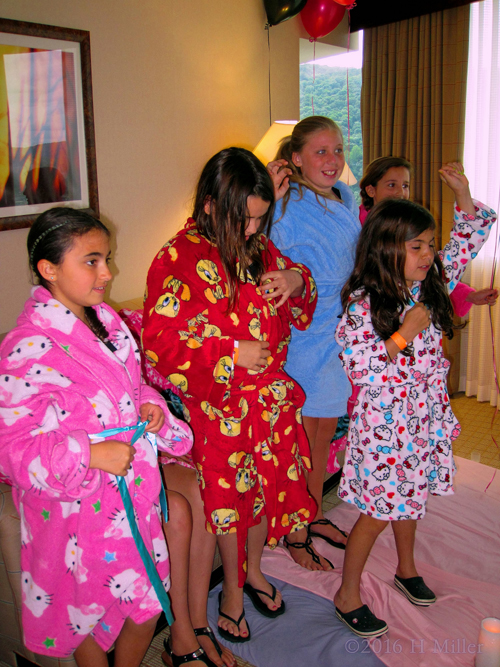 Putting On Spa Robe Putting On Spa Robe