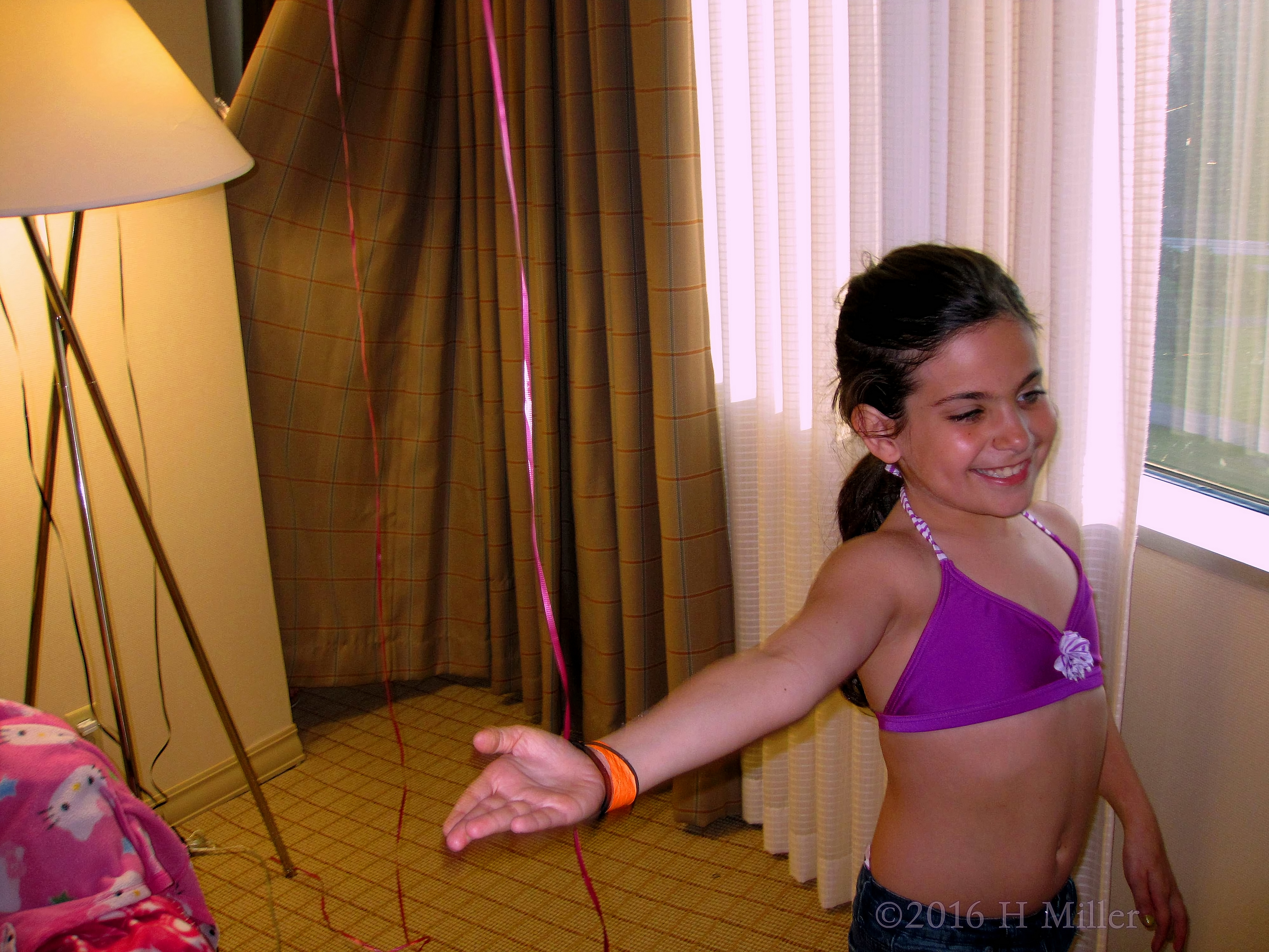 Striking A Pose For The Fashion Show In A Purple Bikini Striking A Pose For The Fashion Show In A Purple Bikini