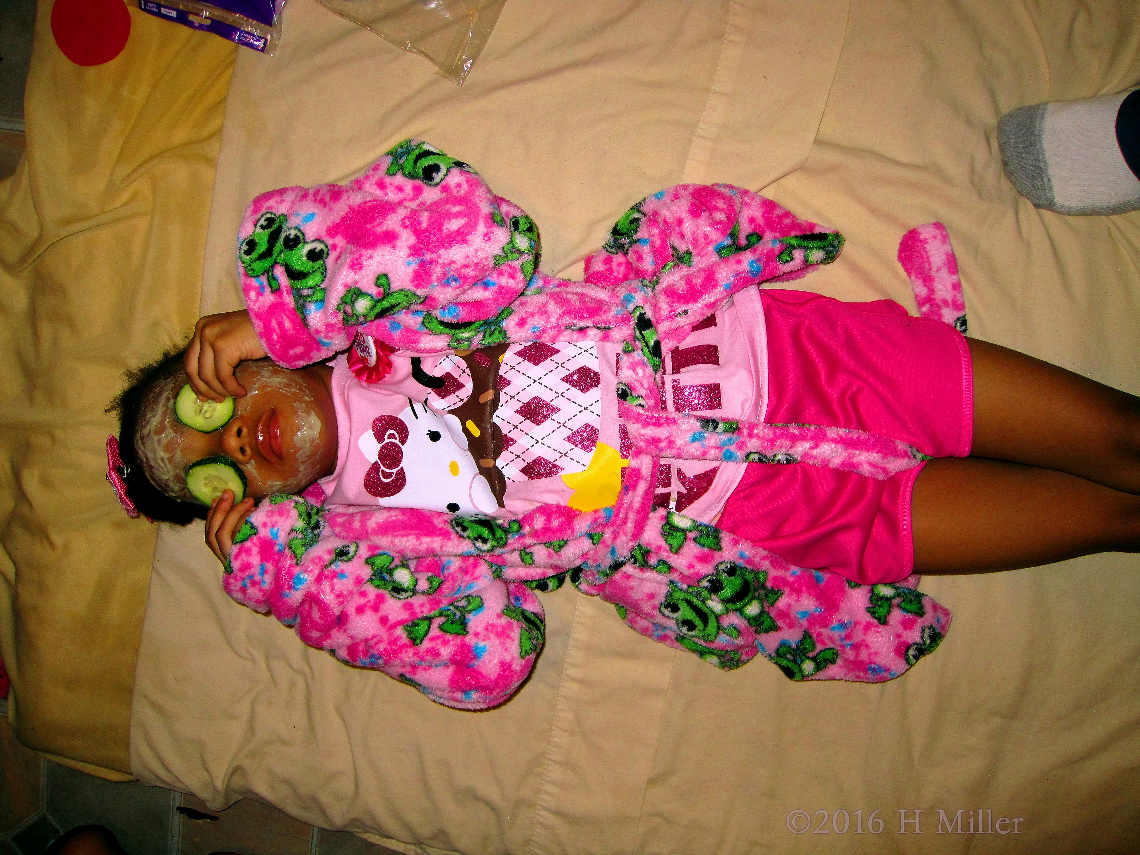 Adjusting Her Cucumbers During Her Kids Facial Adjusting Her Cucumbers During Her Kids Facial