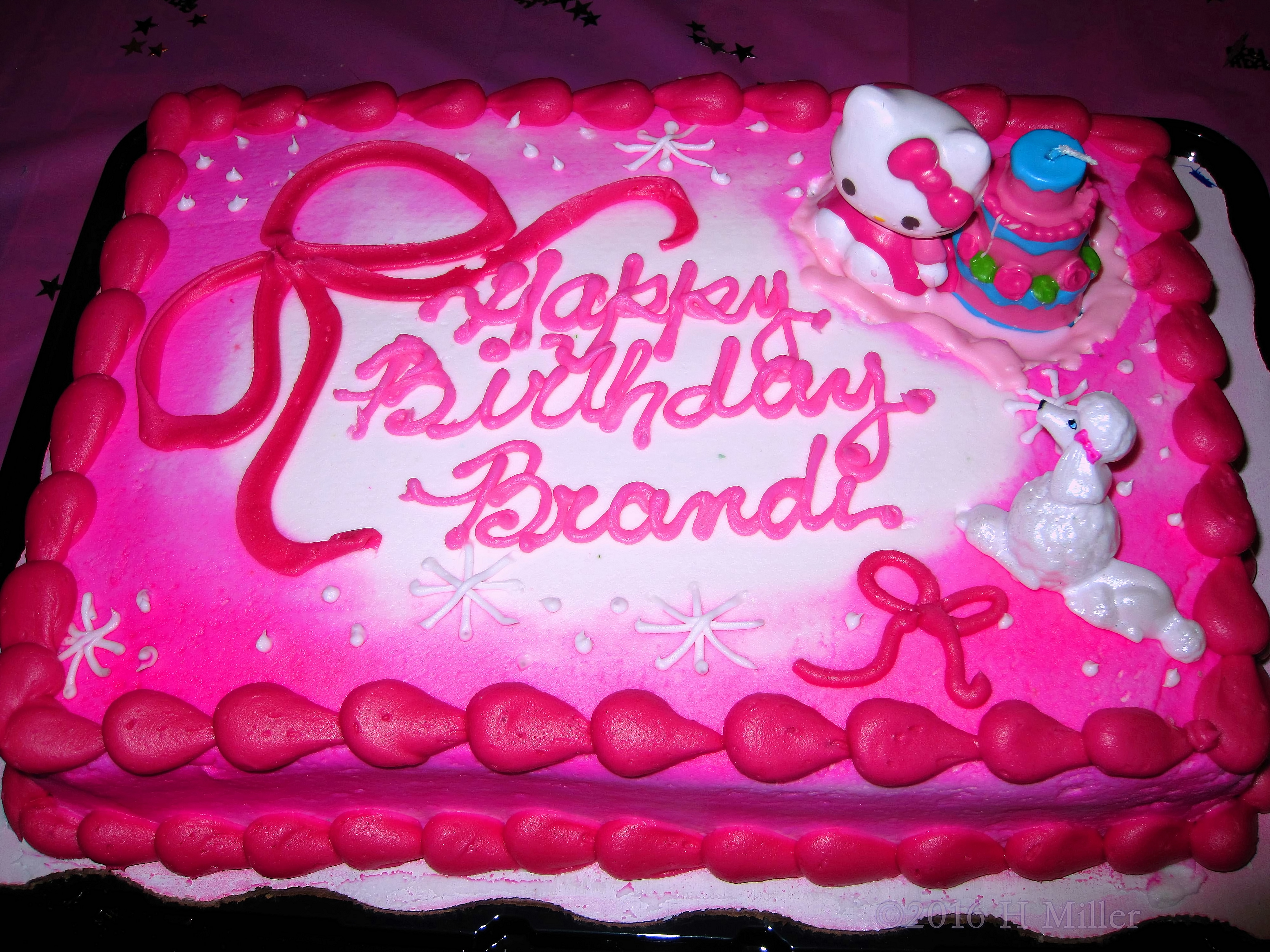Her Cute Hello Kitty Themed Birthday Cake 