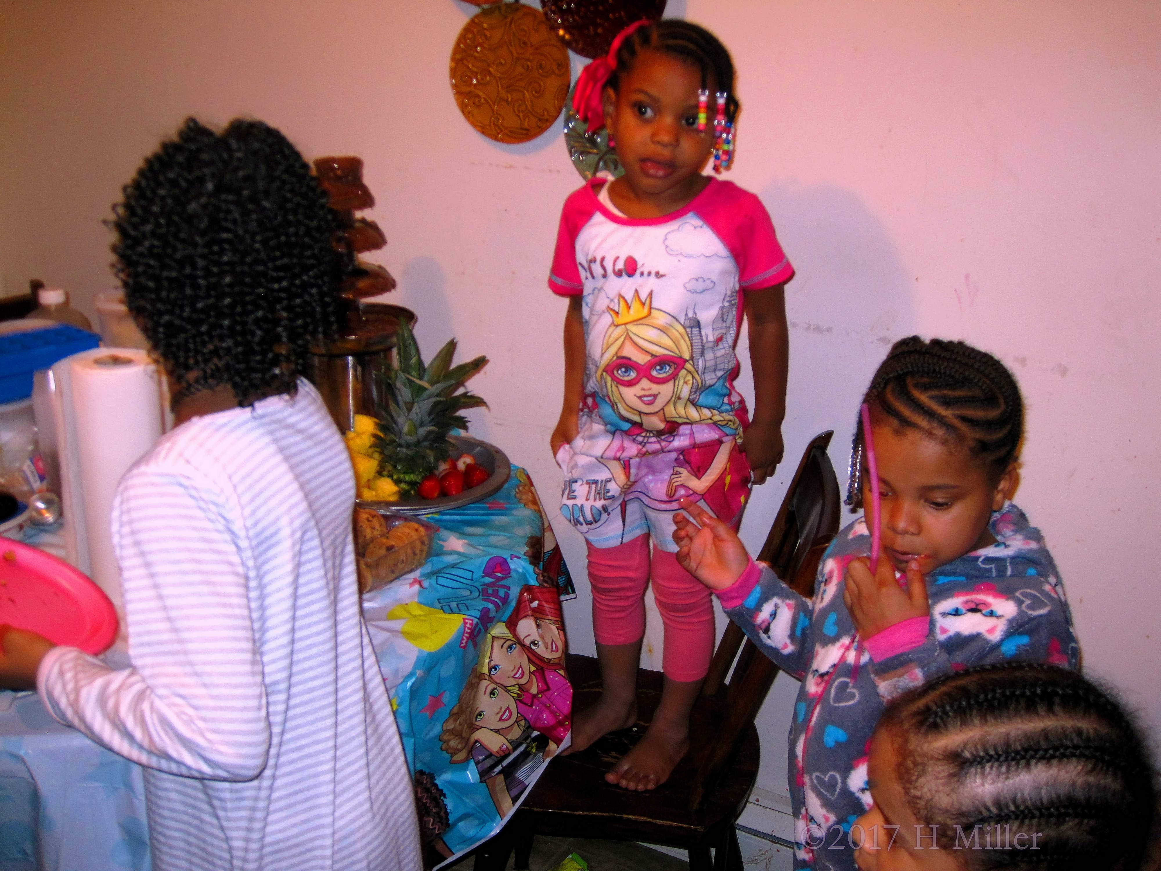 Briana And Her Friends Enjoy The Snacks At The Table! Briana And Her Friends Enjoy The Snacks At The Table!
