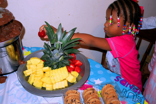 Birthday Girl Picks A Berry For The Chocolate Fondue Fountain! Birthday Girl Picks A Berry For The Chocolate Fondue Fountain!