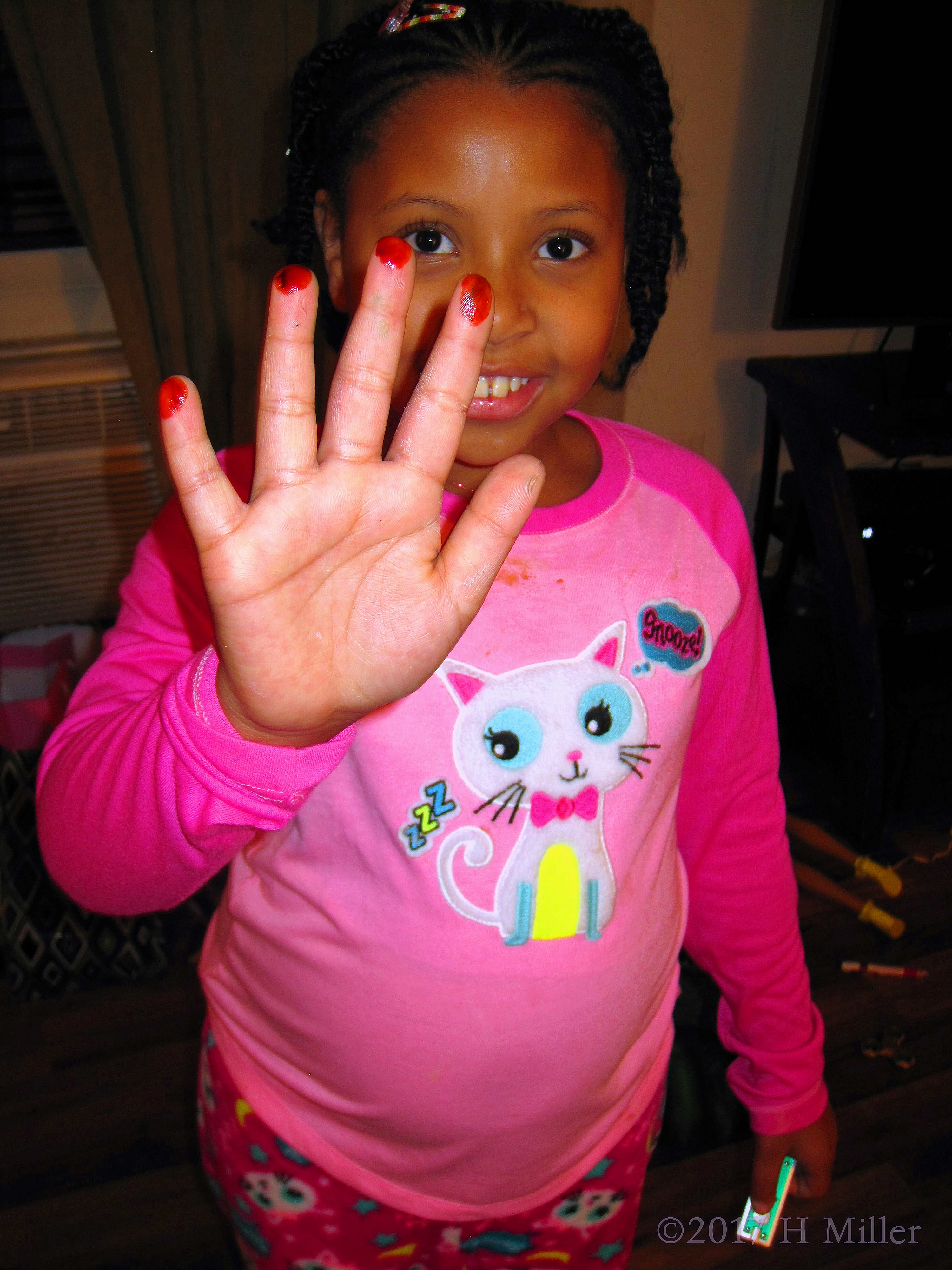 Showing Her Fingertips Tinged With Red Candy. Showing Her Fingertips Tinged With Red Candy.