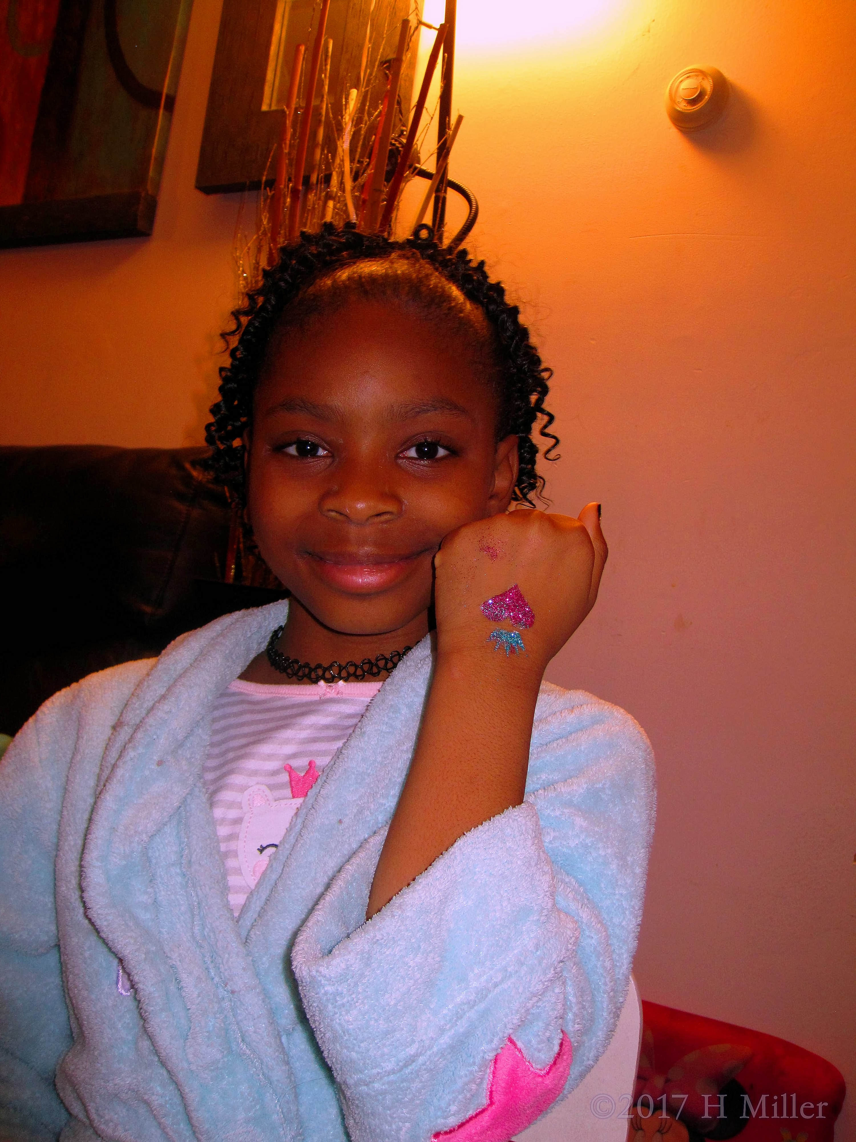 Smiling As She Gets The Pretty Heart Tattooed On Her Hand. Smiling As She Gets The Pretty Heart Tattooed On Her Hand.