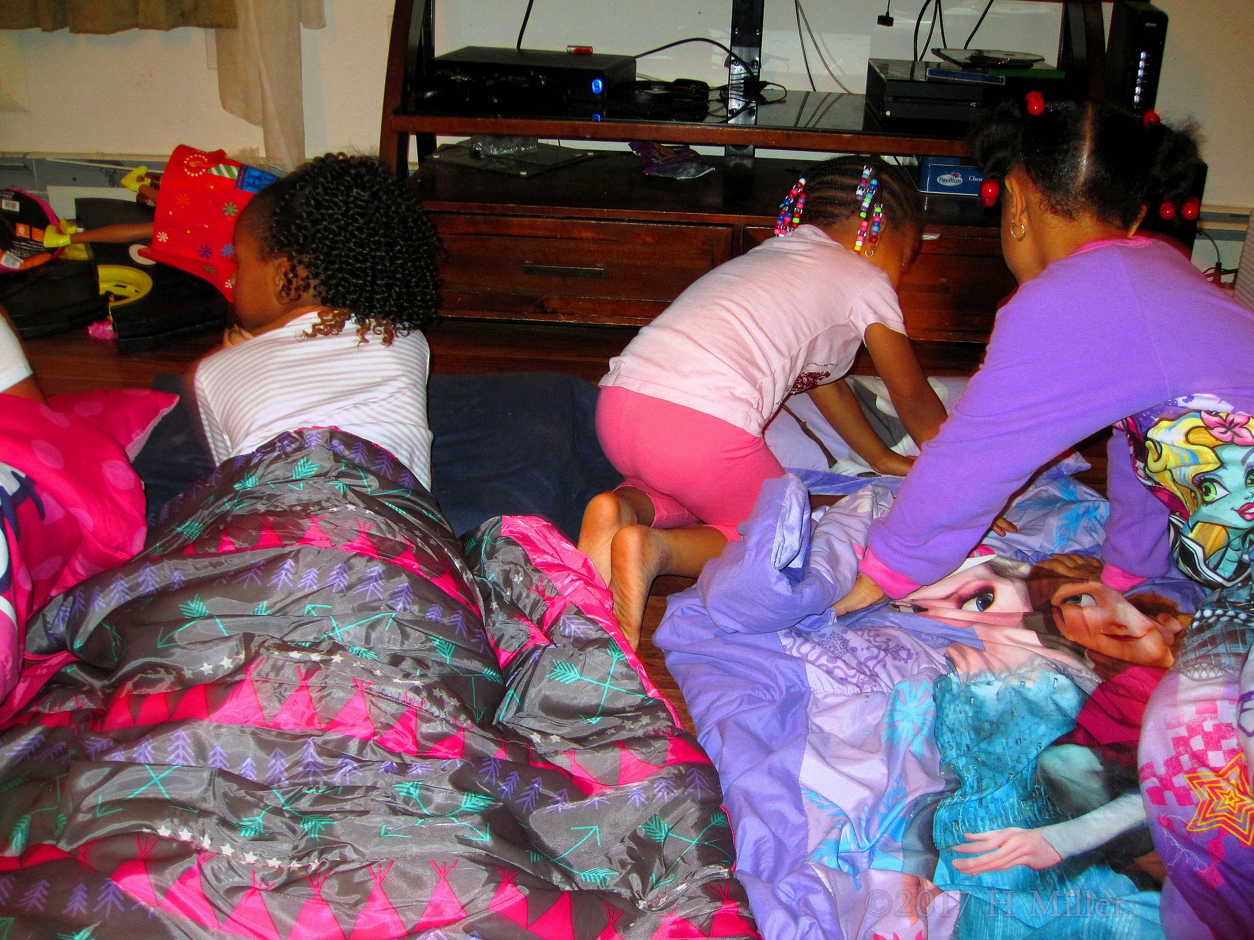 The Girls Arrange The Blankets At Space. 