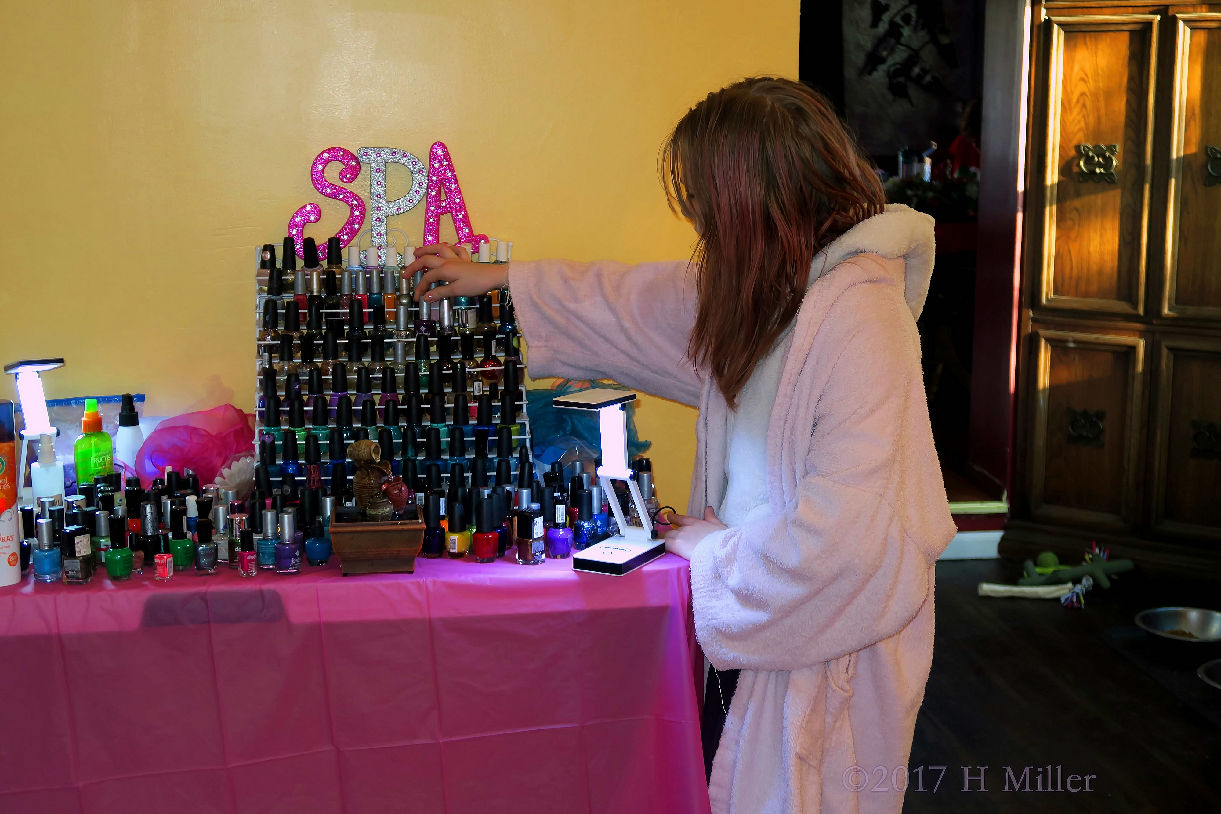 Selecting A Beautiful Shade For Her Mini Manicure. Selecting A Beautiful Shade For Her Mini Manicure.