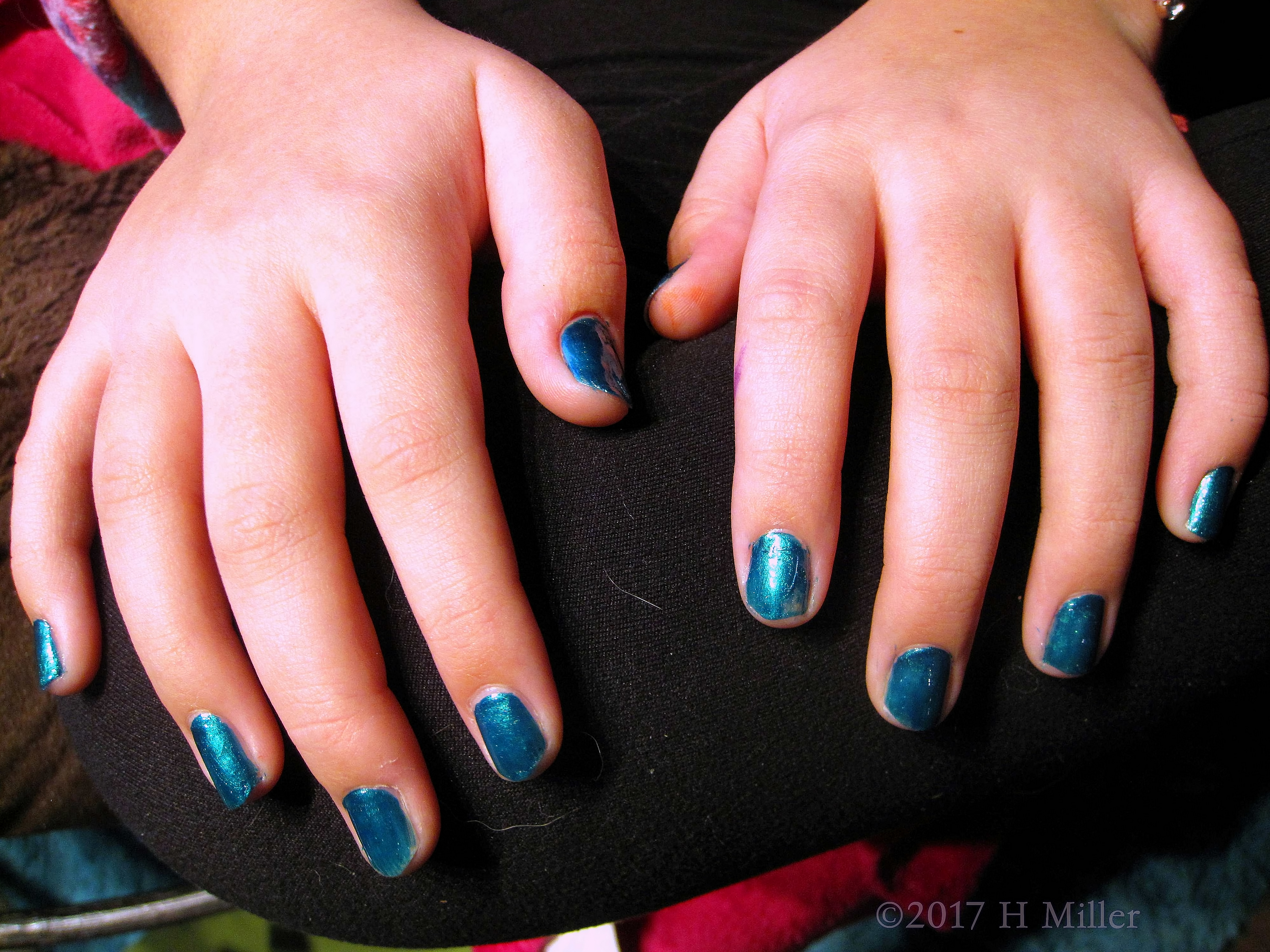 Shiny Metallic Blues For This Girls Manicure. Shiny Metallic Blues For This Girls Manicure.