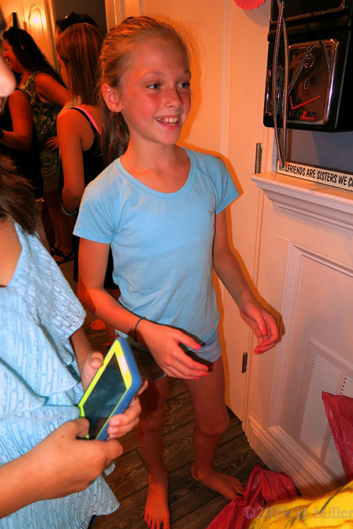 Beaming In Blue! Party Guests Lined Up To Receive Spa Robes! Beaming In Blue! Party Guests Lined Up To Receive Spa Robes!