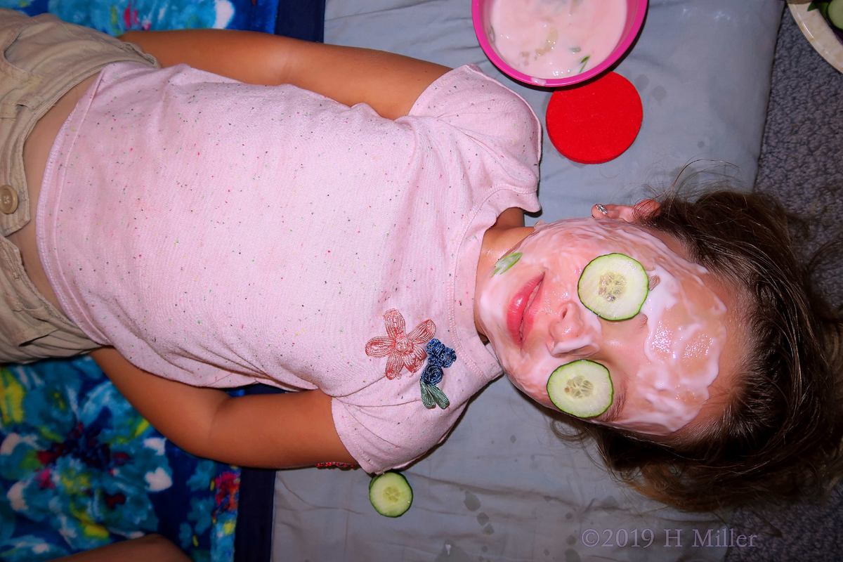 Relaxing With Cukes On Her Eyes During Facials For Girls At The Spa For Kids! 