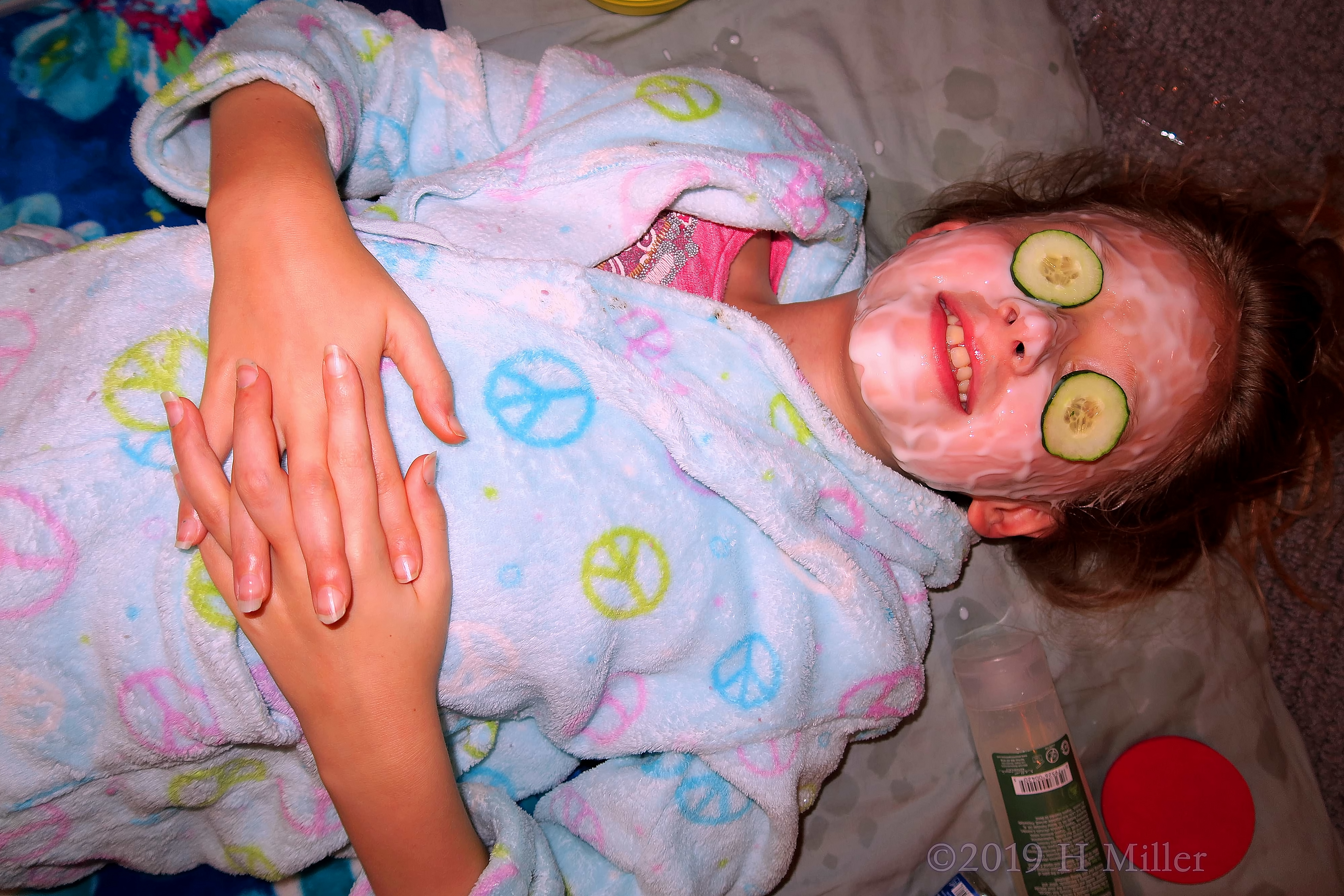 Smiling With Cukes On Her Eyes During Facials For Girls! Smiling With Cukes On Her Eyes During Facials For Girls!