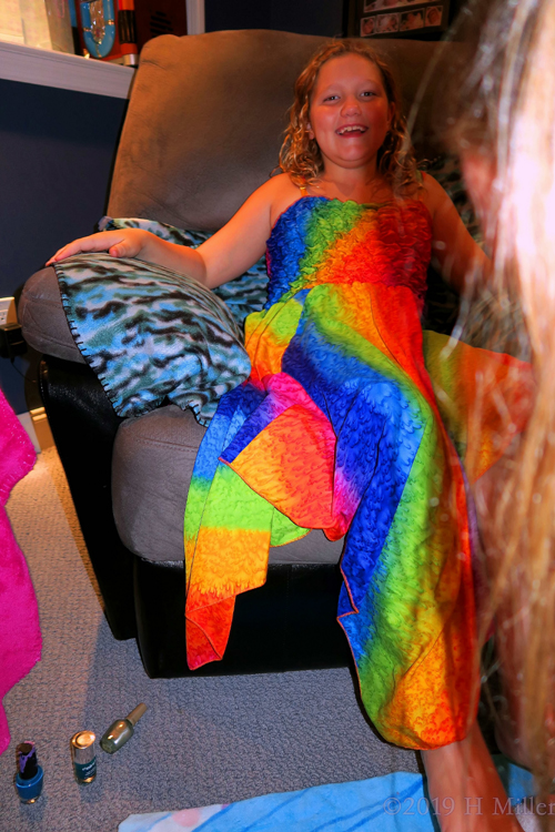 Colorful And Chilling! Spa Party Guest Poses On The Couch At The Party!