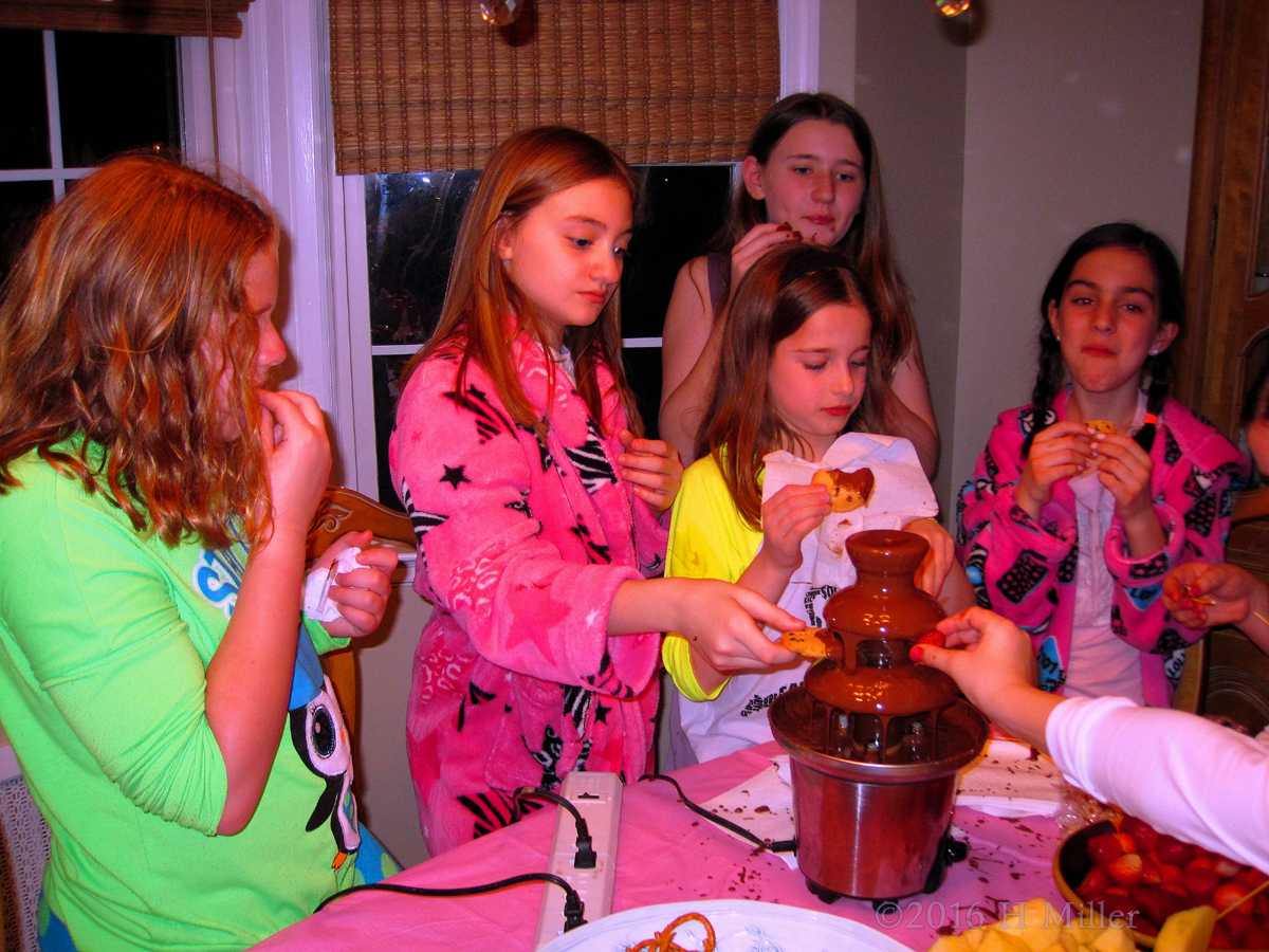 Everyone Enjoys Their Cookies With The Chocolate Fondue!