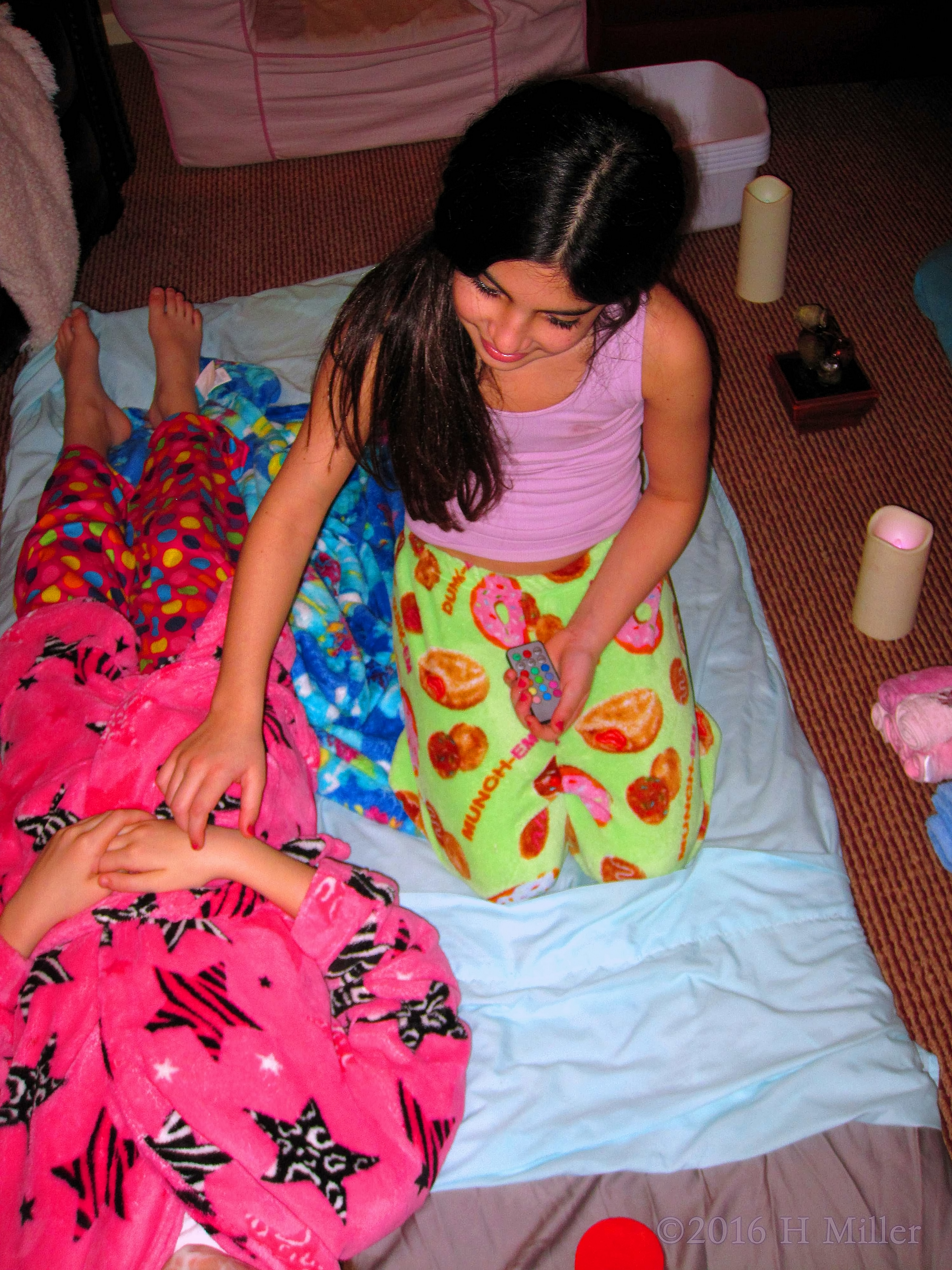 She Chuckles While Her Friend Relaxes During The Kids Facial! She Chuckles While Her Friend Relaxes During The Kids Facial!