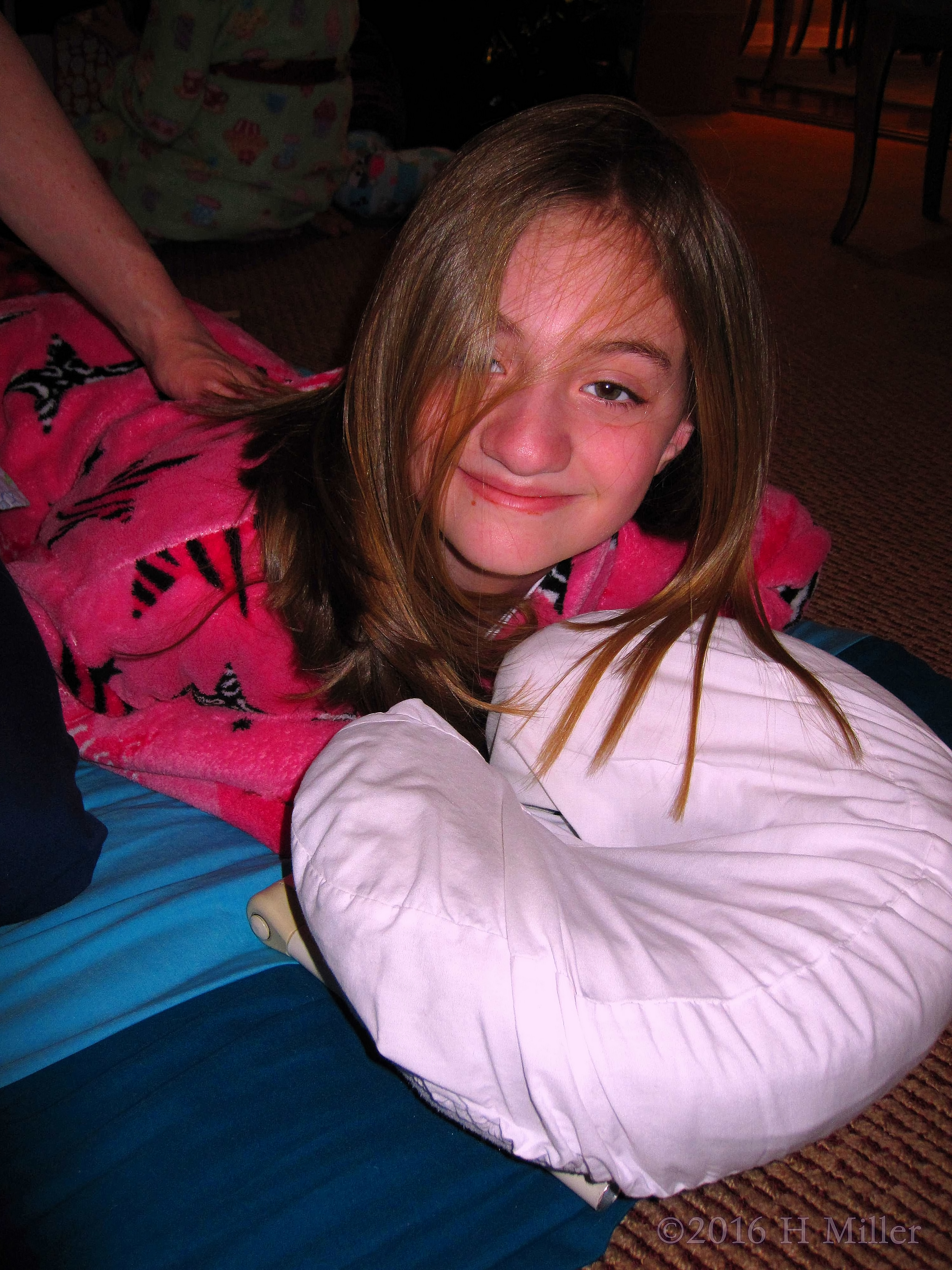 Smiling During Her Relaxing Kids Massage 