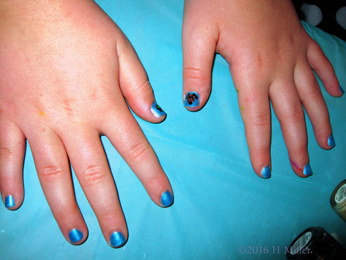 Closeup Of The Cute Doggie Nail Art Over The Blue Polish!