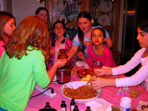 Kids Having Fun Eating Chocolate Fondue At Brooke's Spa Birthday Party