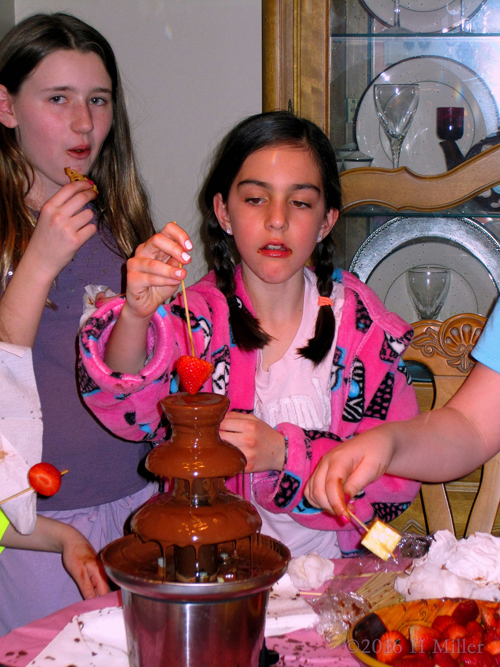 One More Dip Of The Strawberry Into The Awesome Chocolate Fondue!