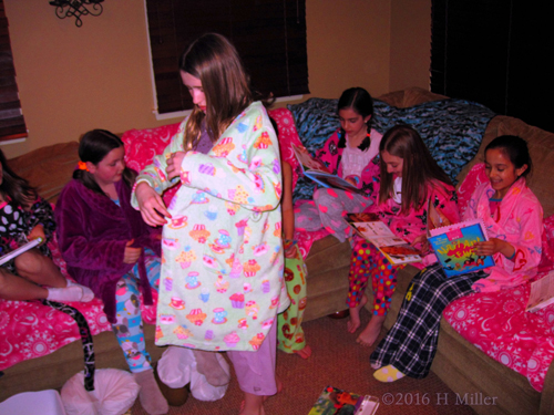 She Adjusts Her Colorful Spa Robe She Adjusts Her Colorful Spa Robe