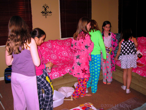 Spa Party Girls Are Gathered At The Activity Area, Waiting For Their Spa Treatments.