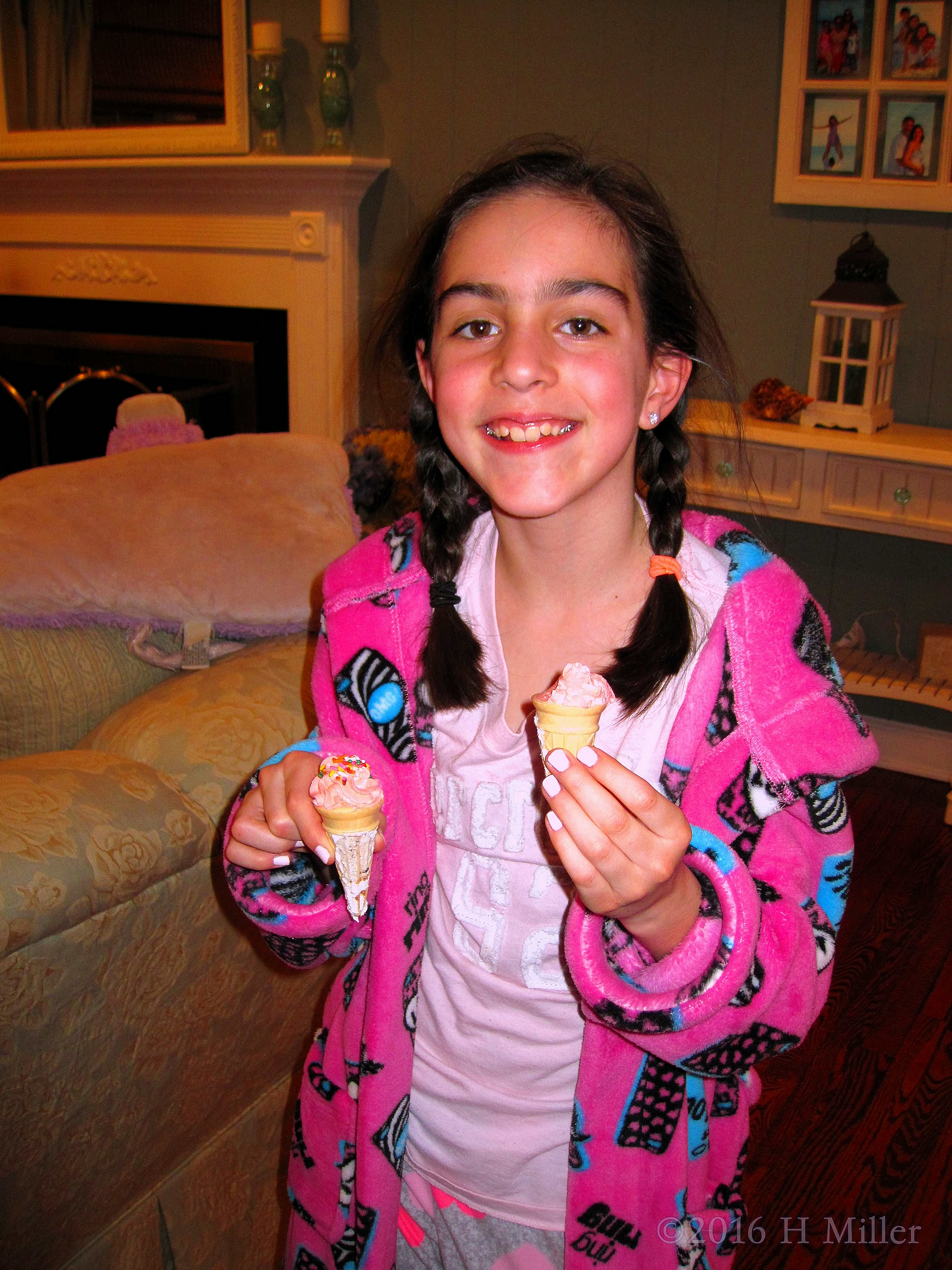 Smiling With Two Ice Cream Cones From The Birthday Cake! 