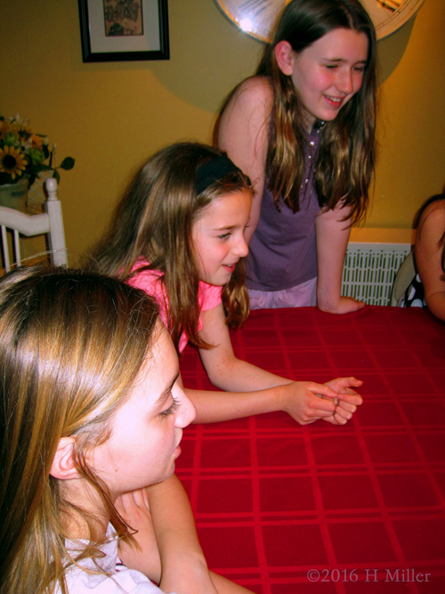 Spa Party Guests Gathered Around The Birthday Cake Table! Spa Party Guests Gathered Around The Birthday Cake Table!