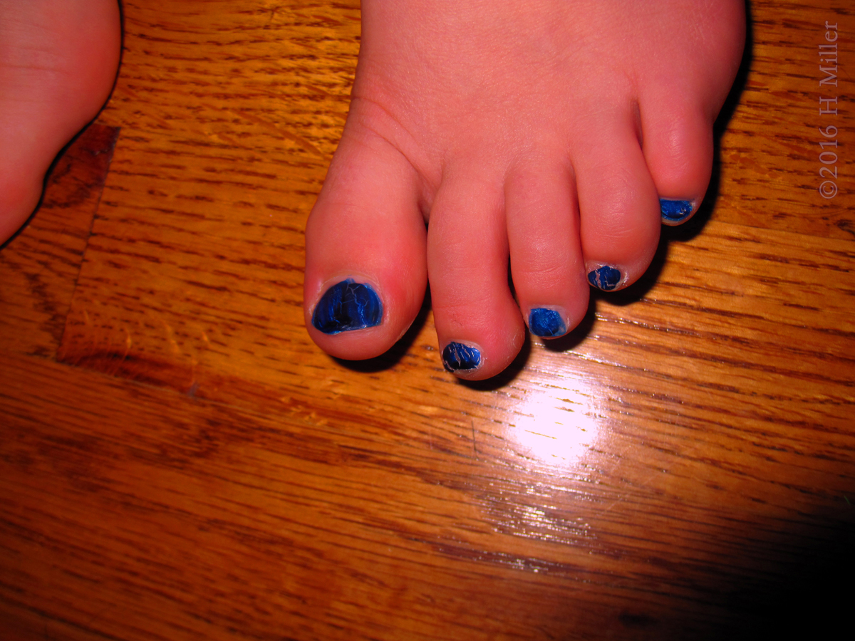 Black Polish With Blue Shatter For This Kids Pedicure. 