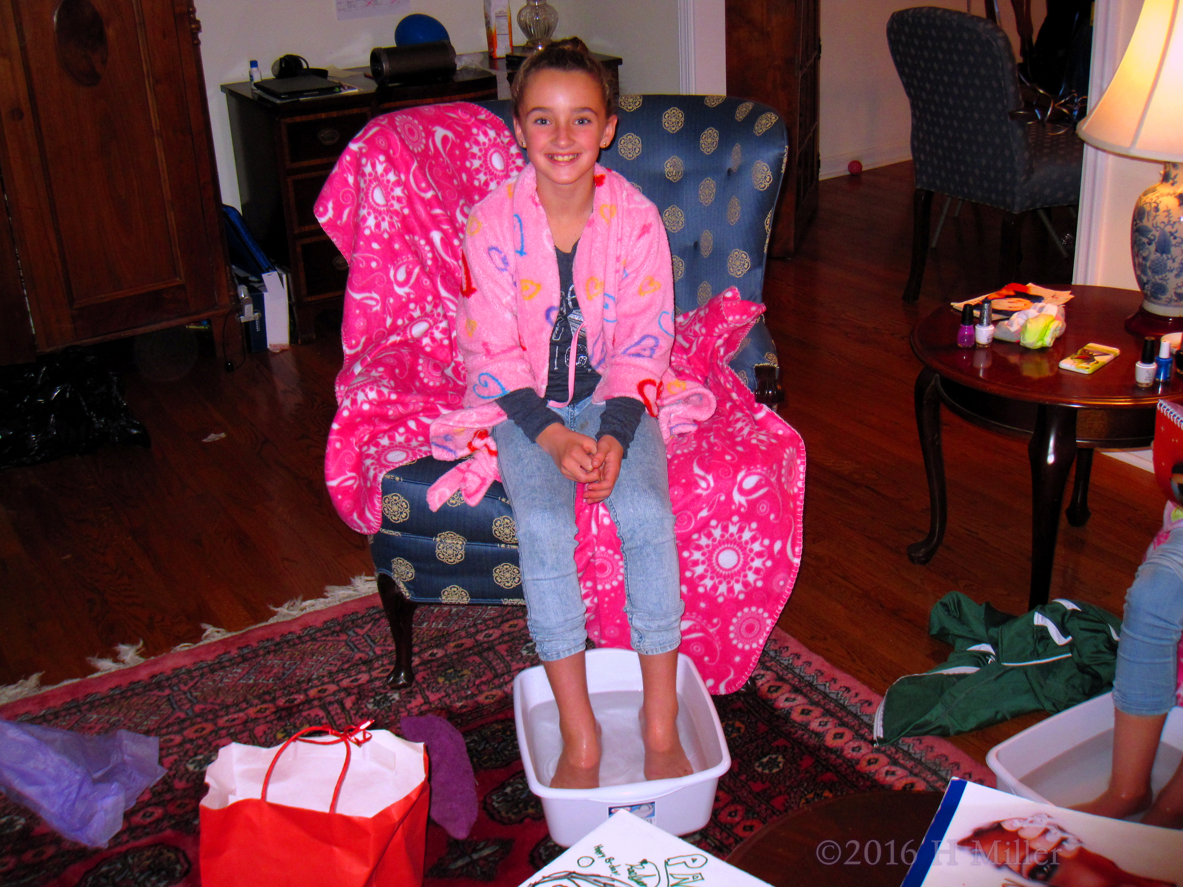 She Is Enjoying Her Kids Pedicure Foot Soak. She Is Enjoying Her Kids Pedicure Foot Soak.