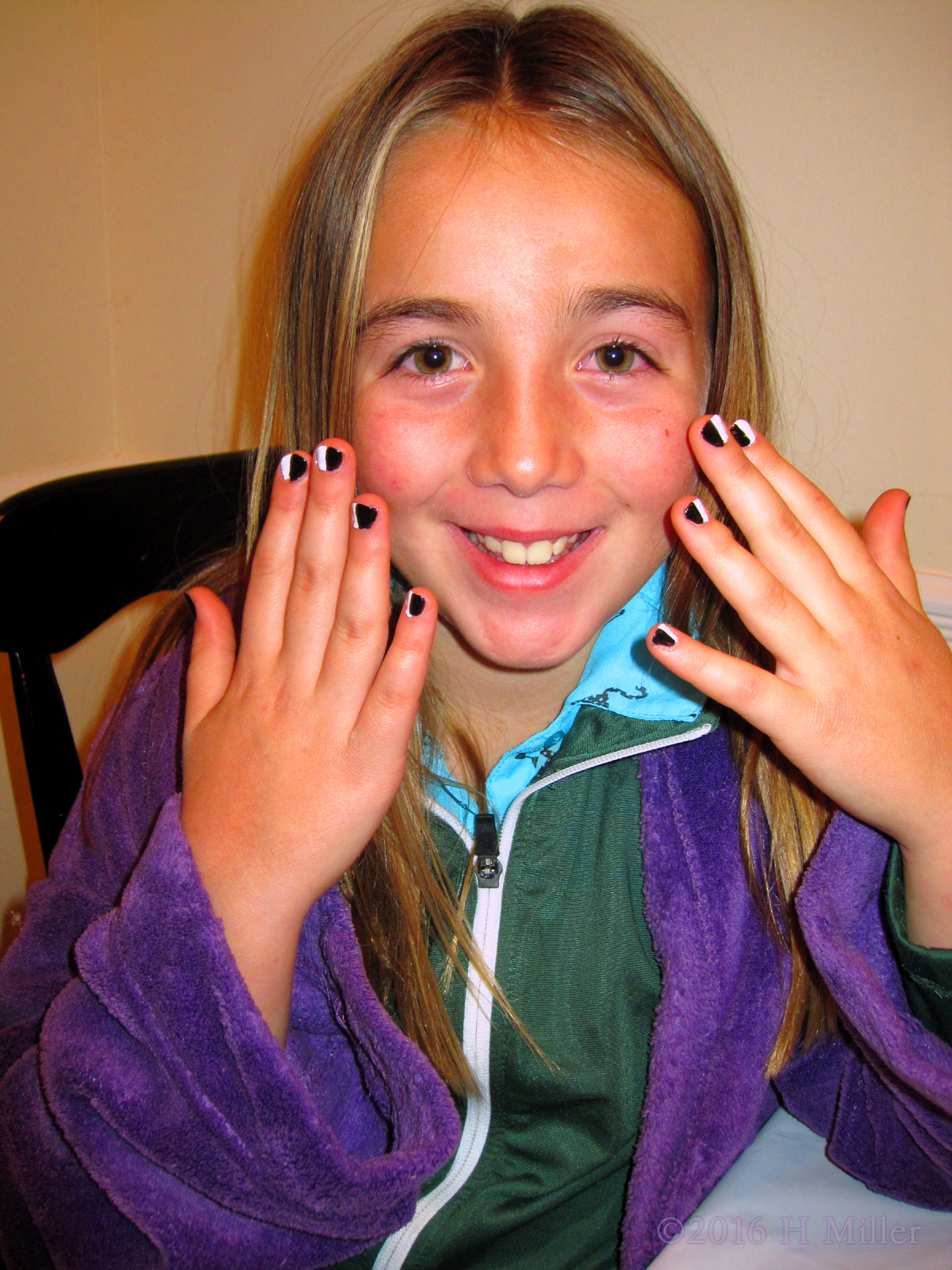 Smiling After Her Kids Nail Spa Manicure Is Completed! 