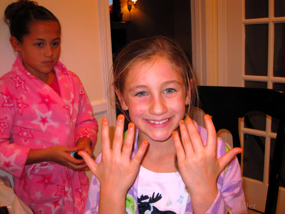 Smiling With Her New Nail Design At The Kids Nail Spa! 