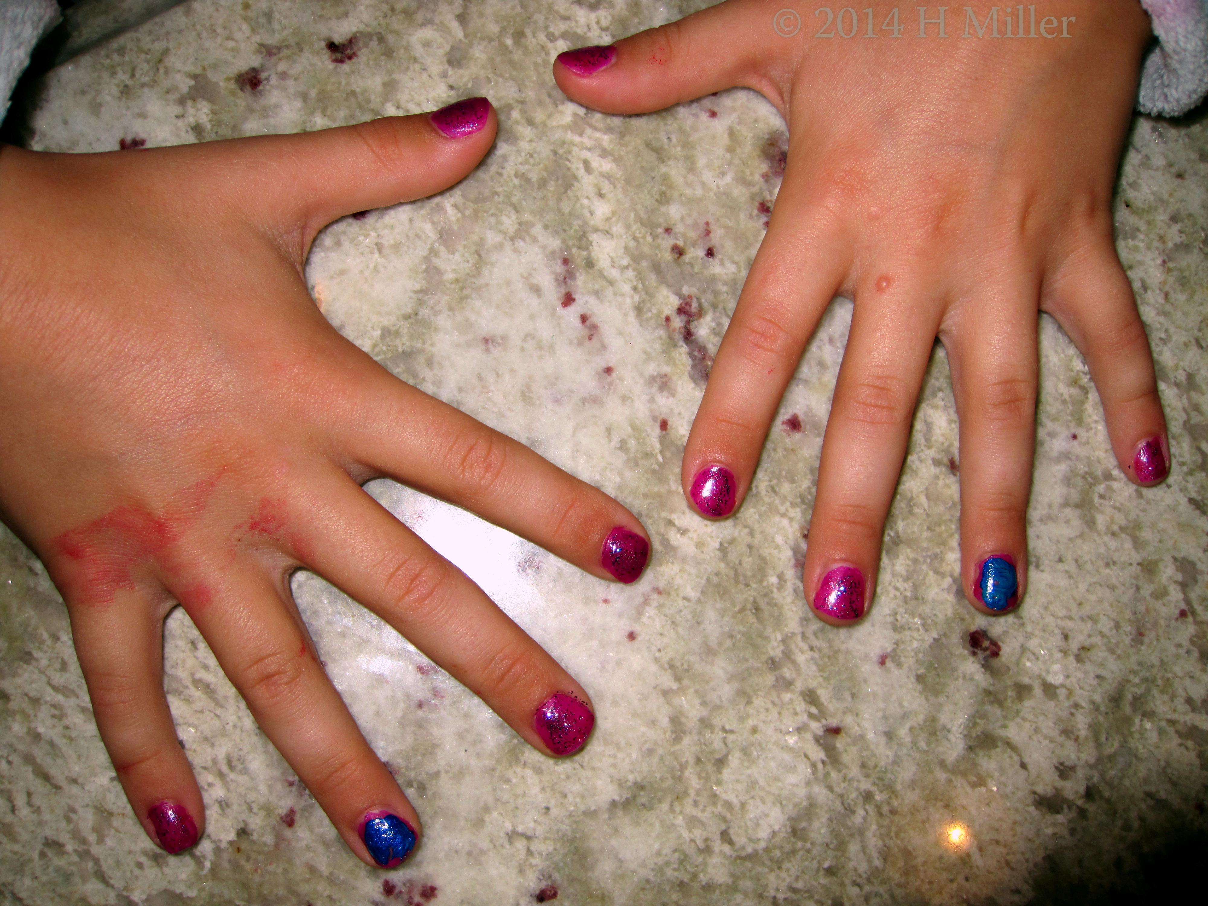 Magenta Polish With Blue Swirl And Glitter. Magenta Polish With Blue Swirl And Glitter.
