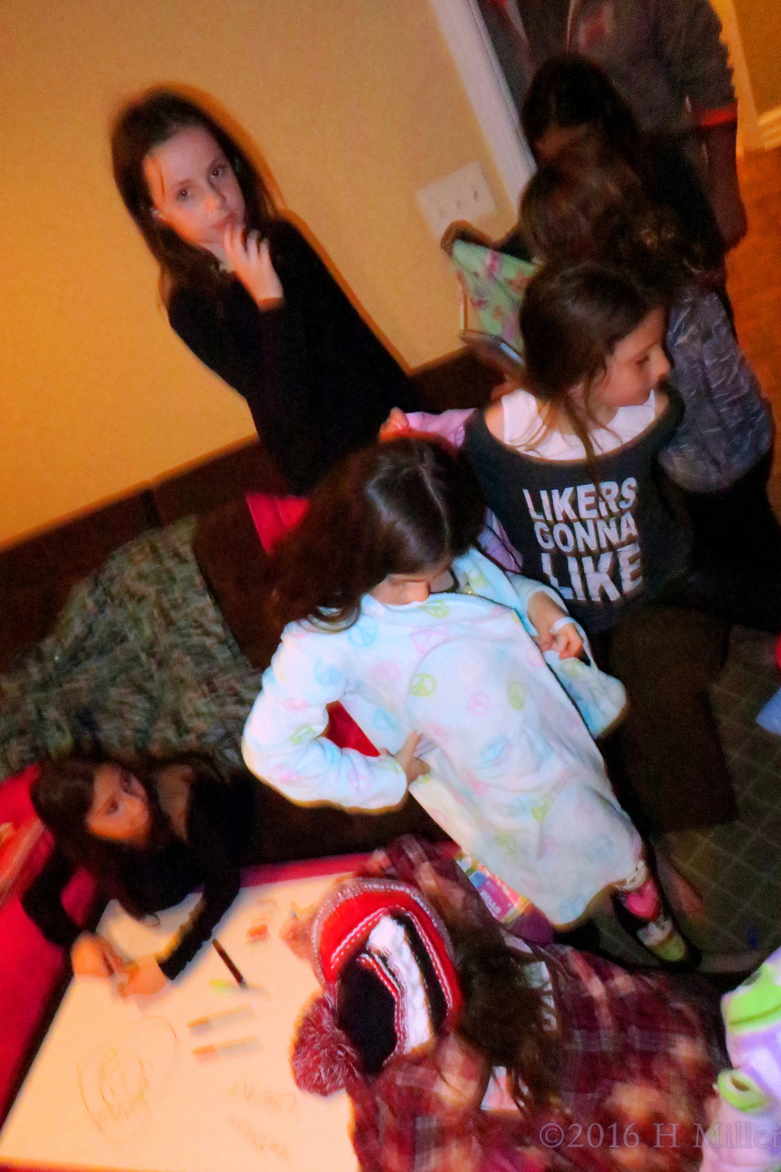 The Kids Trying On Spa Party Robes. The Kids Trying On Spa Party Robes.