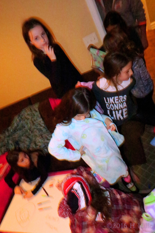 The Kids Trying On Spa Party Robes. The Kids Trying On Spa Party Robes.