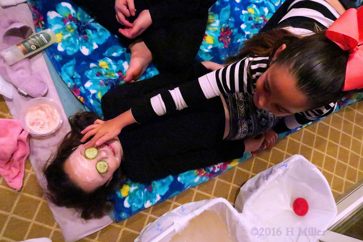 The Girls Helping Out With The Facial. 