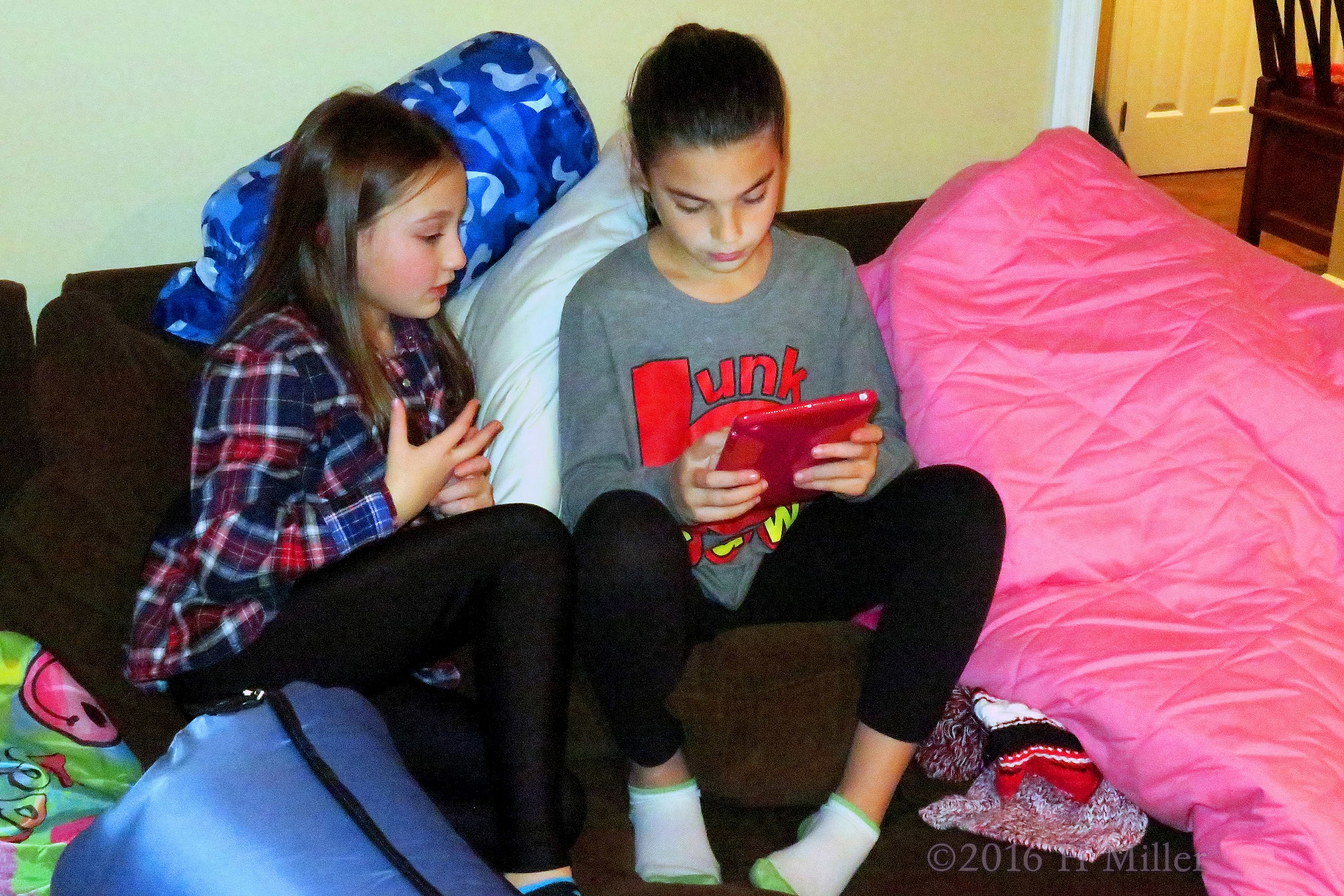 Checking Out Something On Her Tablet. Checking Out Something On Her Tablet.