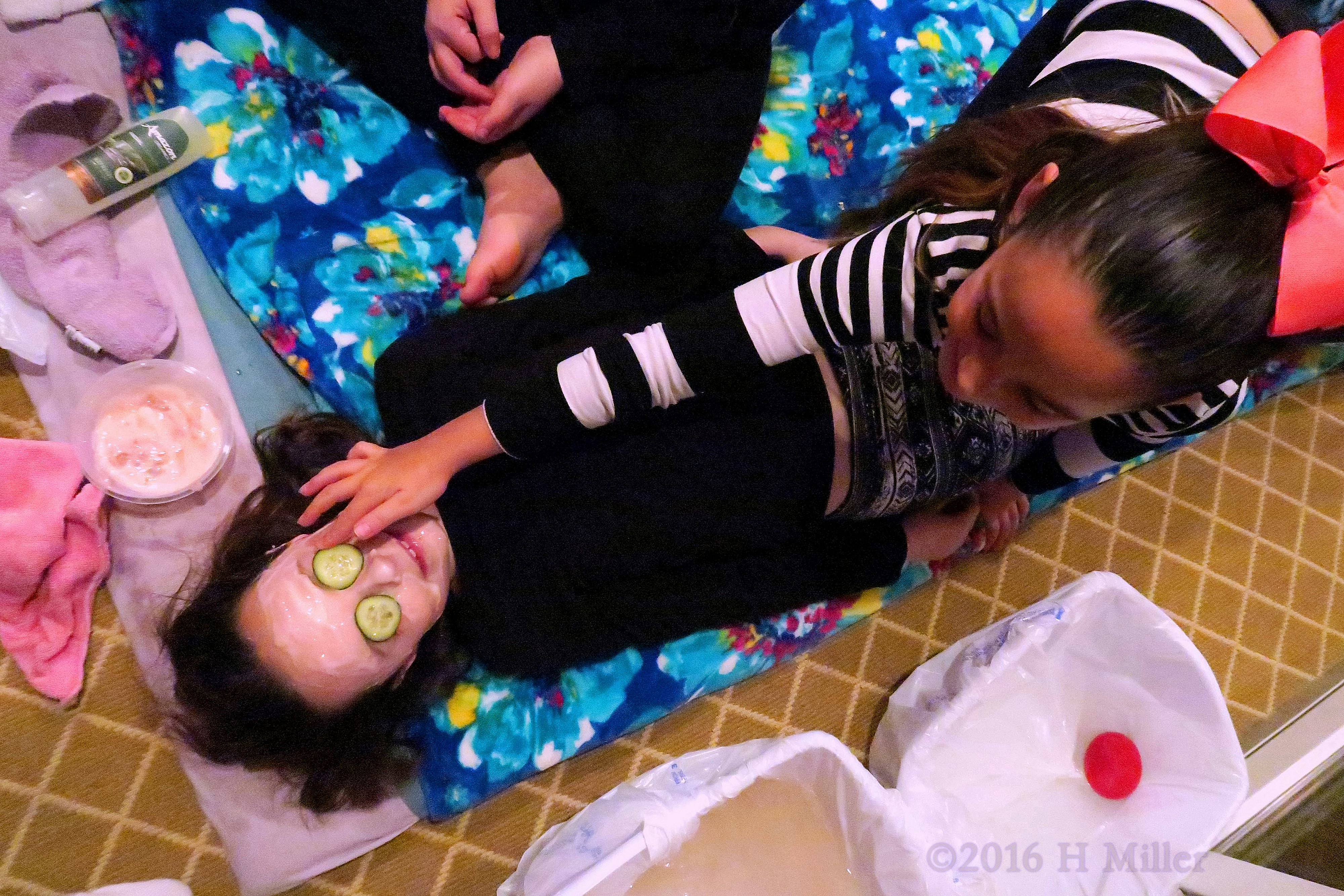 The Girls Helping Out With The Facial. 