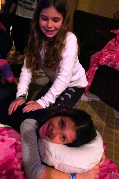 Helping Her Friend's Back With Massage. Helping Her Friend's Back With Massage.