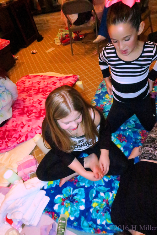 Talking To Their Friend As She Receives A Facial. Talking To Their Friend As She Receives A Facial.