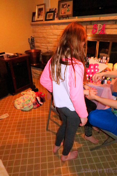 Watching As Her Friend's Nails Get Done. Watching As Her Friend's Nails Get Done.