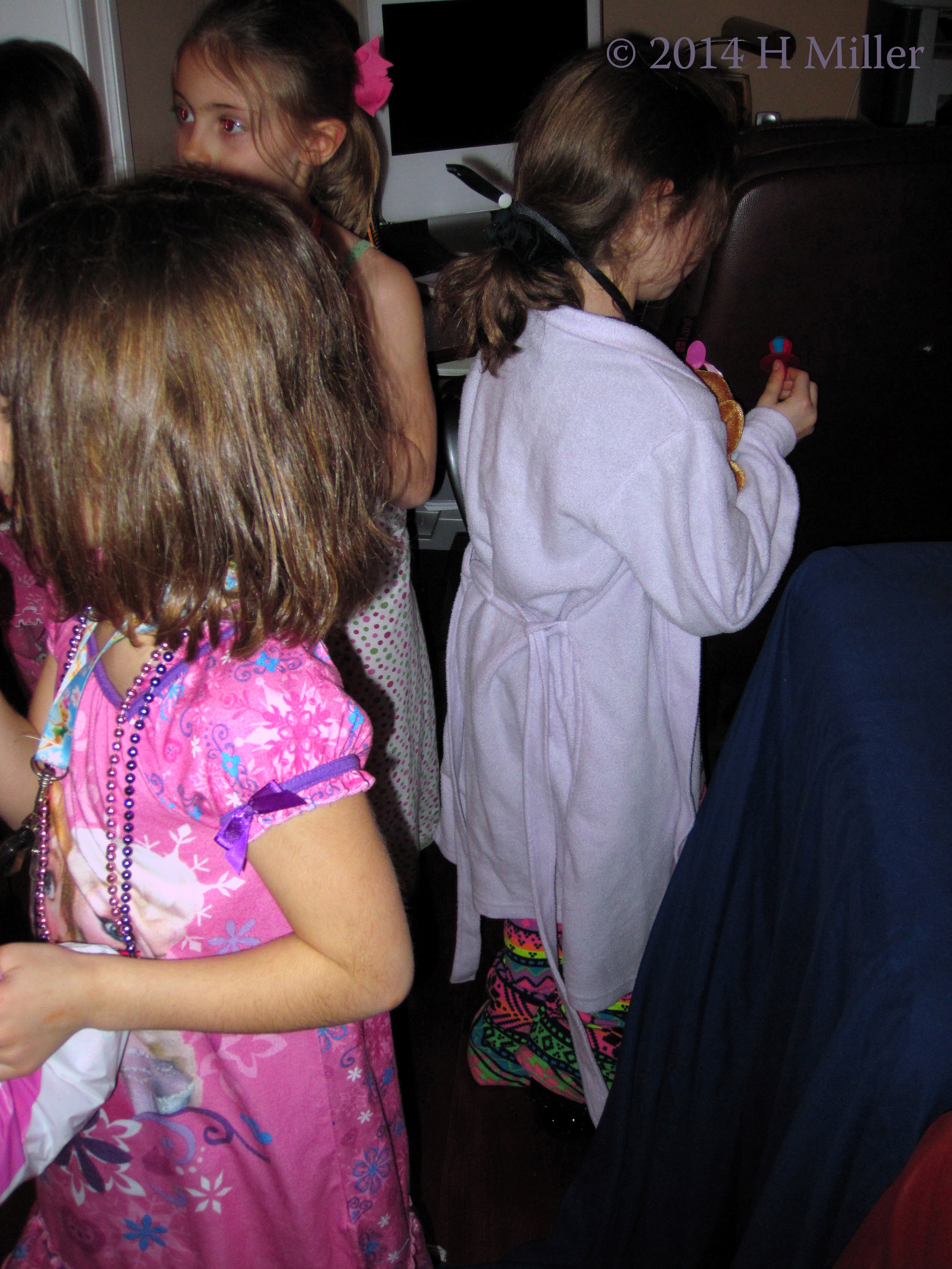 Cassie And Friends Putting On Their Spa Robes Cassie And Friends Putting On Their Spa Robes