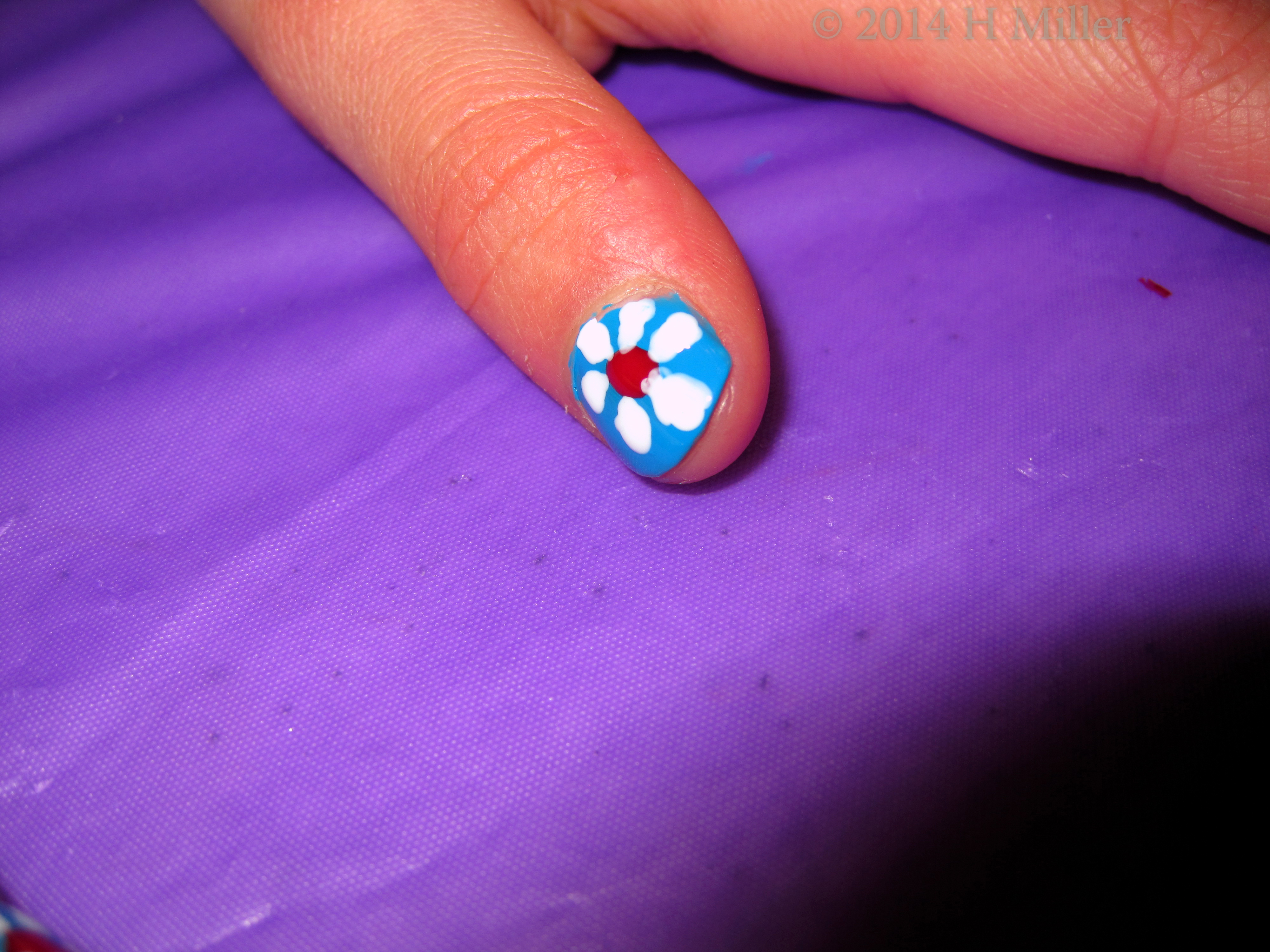 Kids Nail Art Cose Up View Of Flower. Kids Nail Art Cose Up View Of Flower.