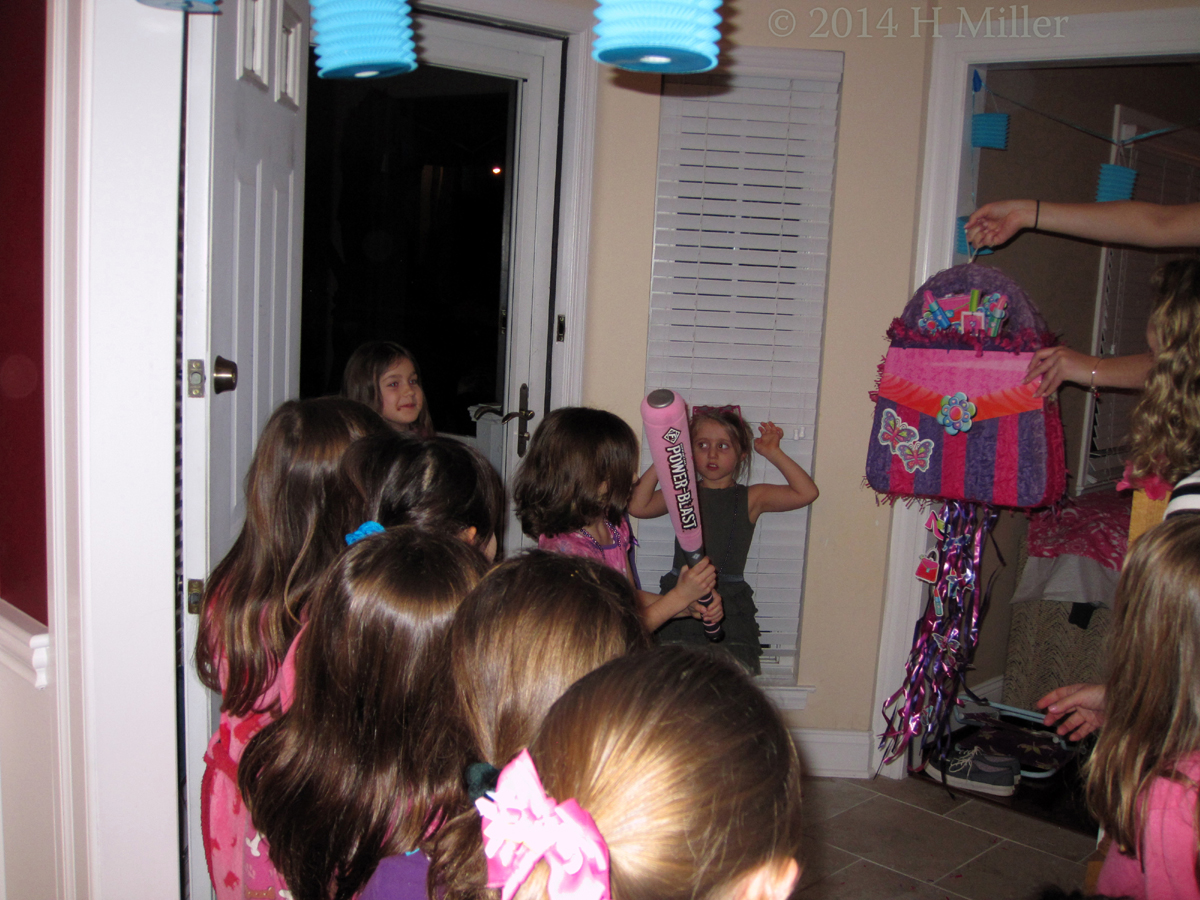 Cassandra, The Birthday Girl, Tries To Break The Pinata Cassandra, The Birthday Girl, Tries To Break The Pinata