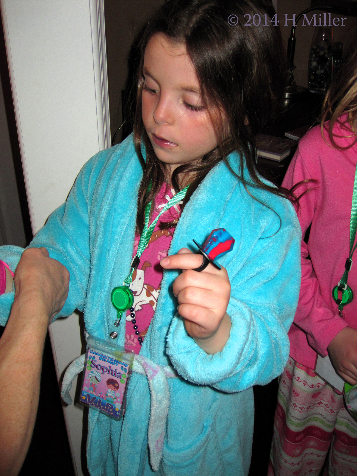 Pulling Up The Sleeves On Sophia's Aqua Color Spa Party Robe. 
