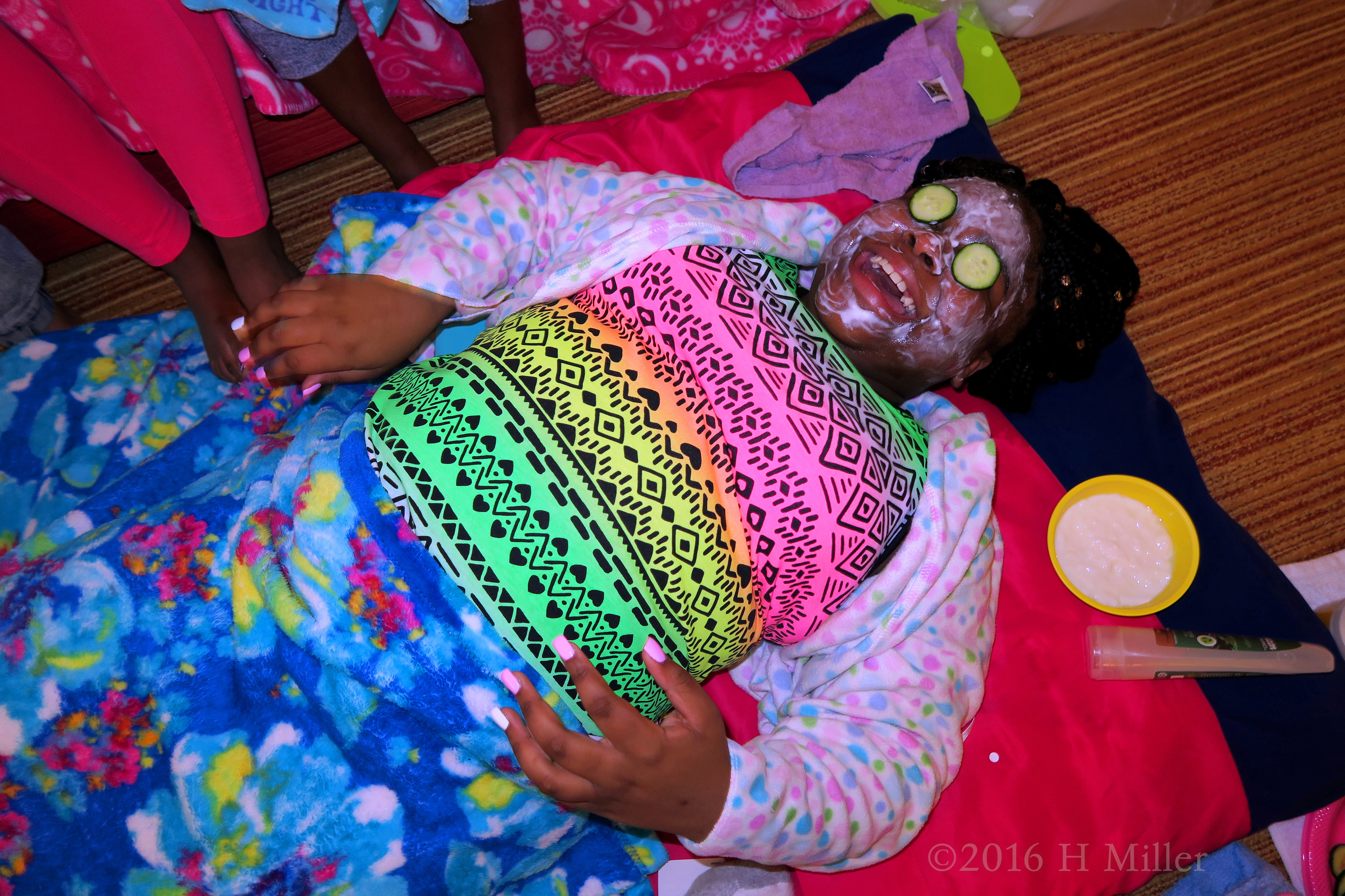 The Birthday Girl Enjoying A Moment Of Peace During Her Facial. The Birthday Girl Enjoying A Moment Of Peace During Her Facial.