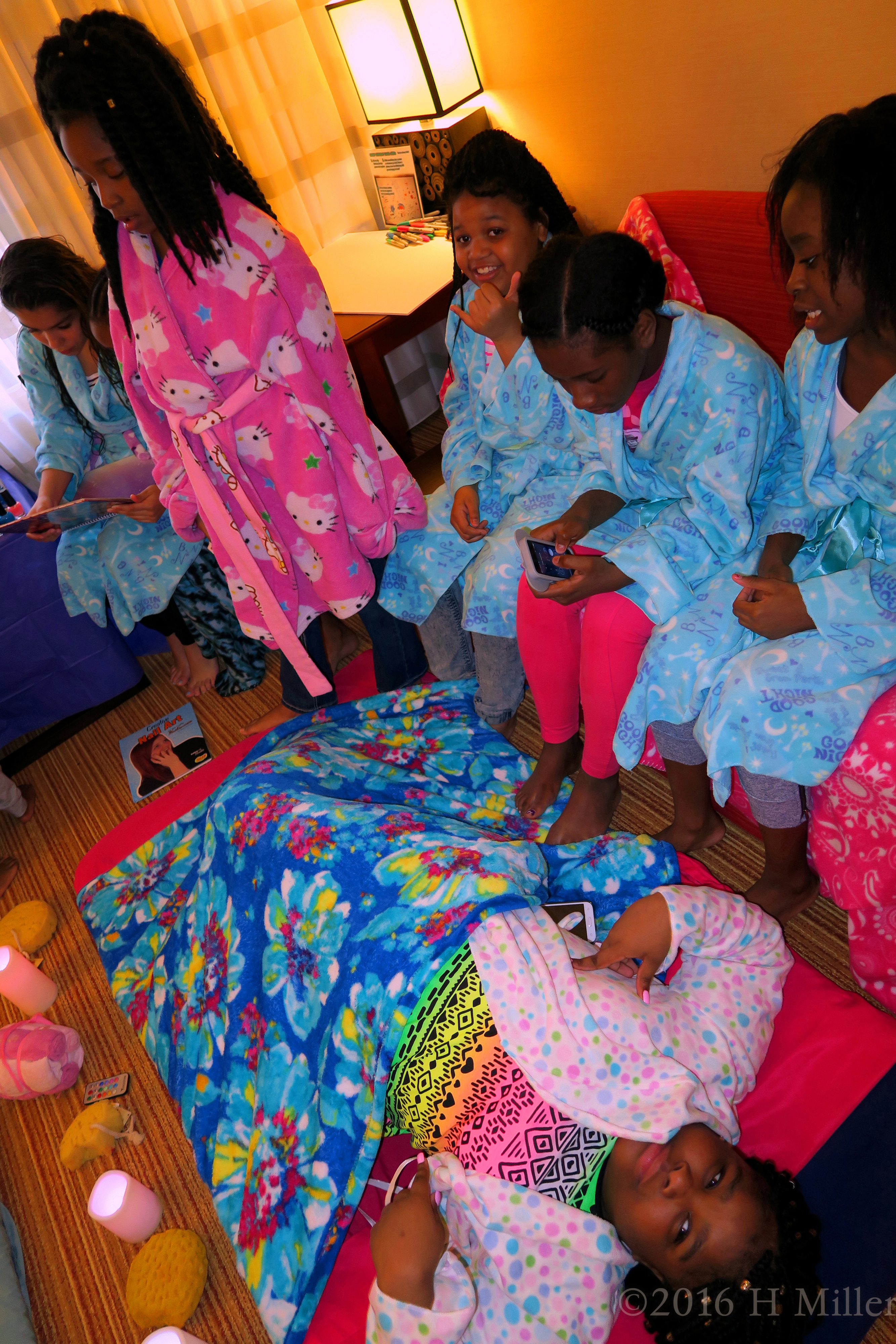 The Birthday Girl With Her Friends Watching As She Gets Her Facial. The Birthday Girl With Her Friends Watching As She Gets Her Facial.